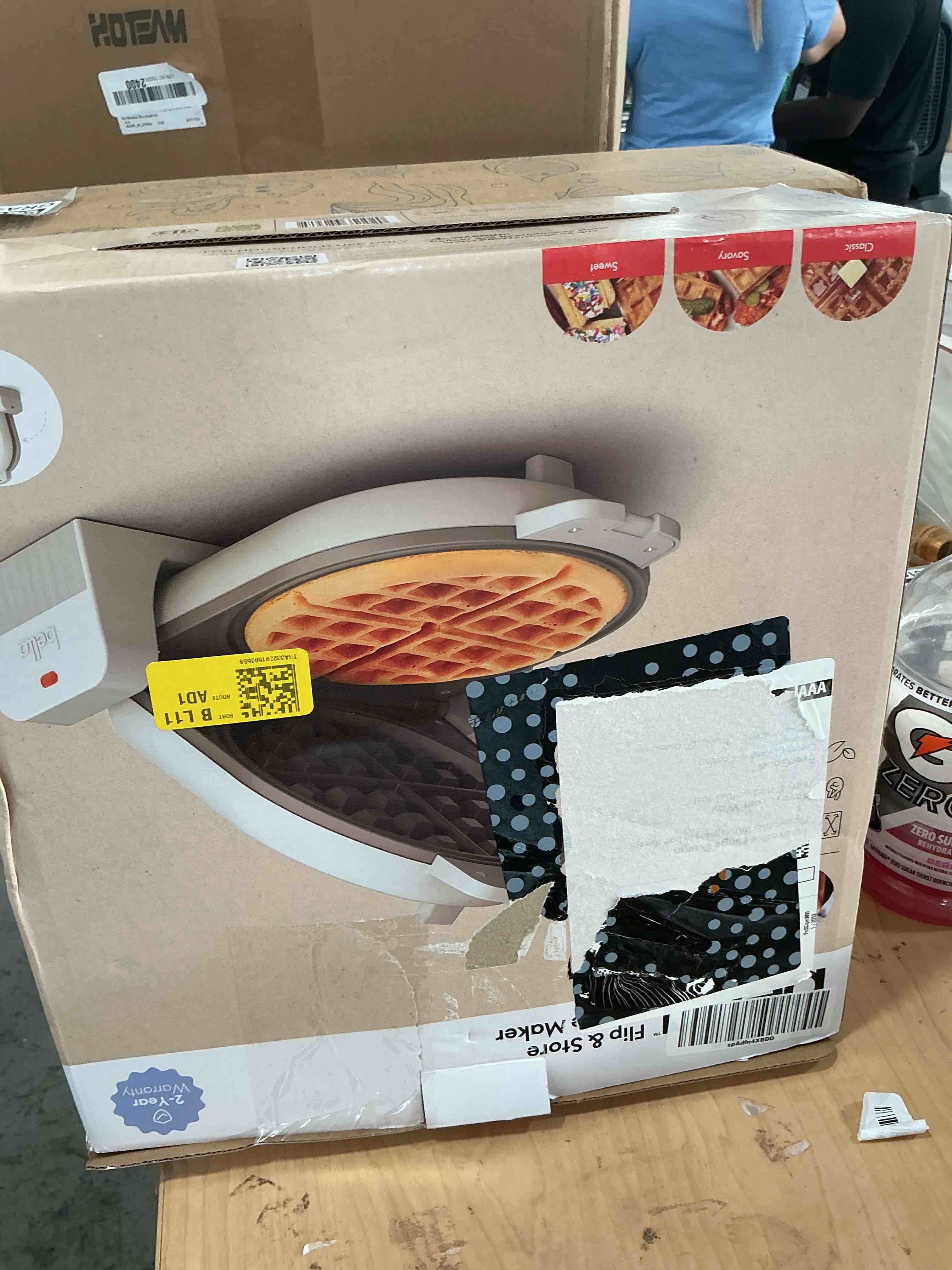 Condition photo showing New/Like New for bella flip-n-store waffle maker with evergood™ ceramic nonstick coating, fits-anywhere™ kitchenware, power indicator light, cool touch handle & cord wrap, 7” wide & 1" deep plates, 1000 watt, oatmilk