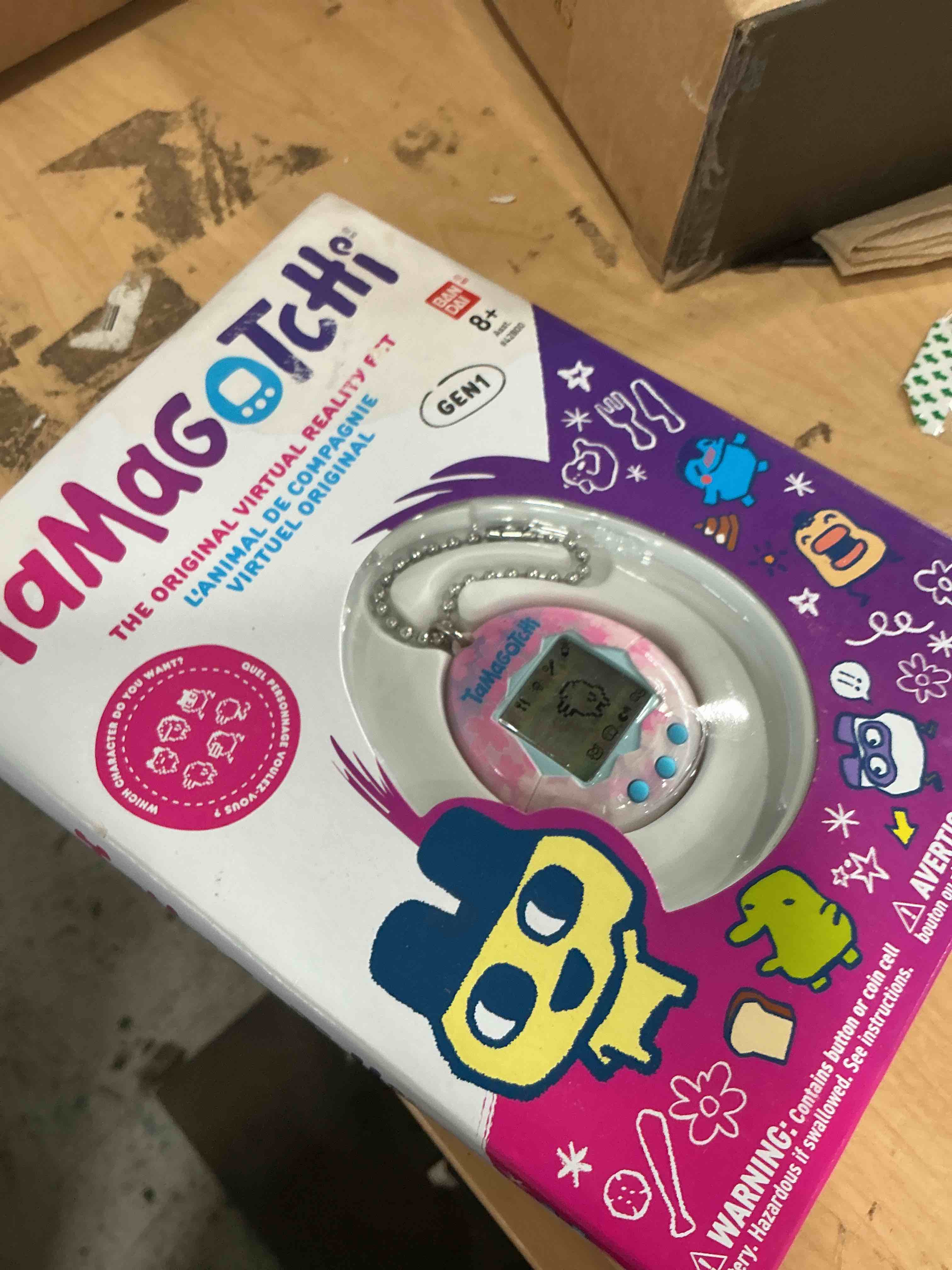 Condition photo showing New/Like New for tamagotchi original - sakura