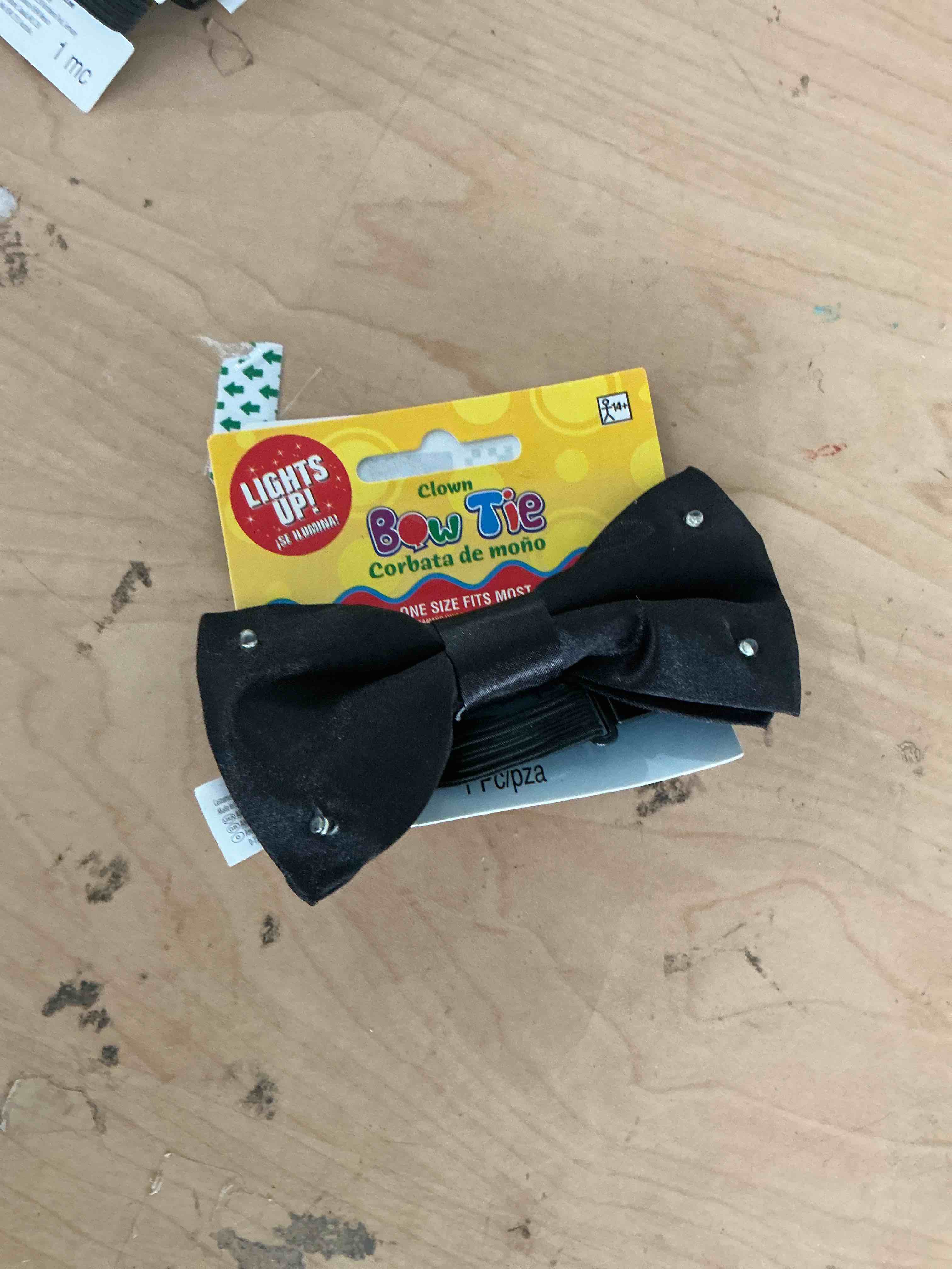 Condition photo showing New/Like New for amscan 849979 adult men's black light-up bow tie, standard size
