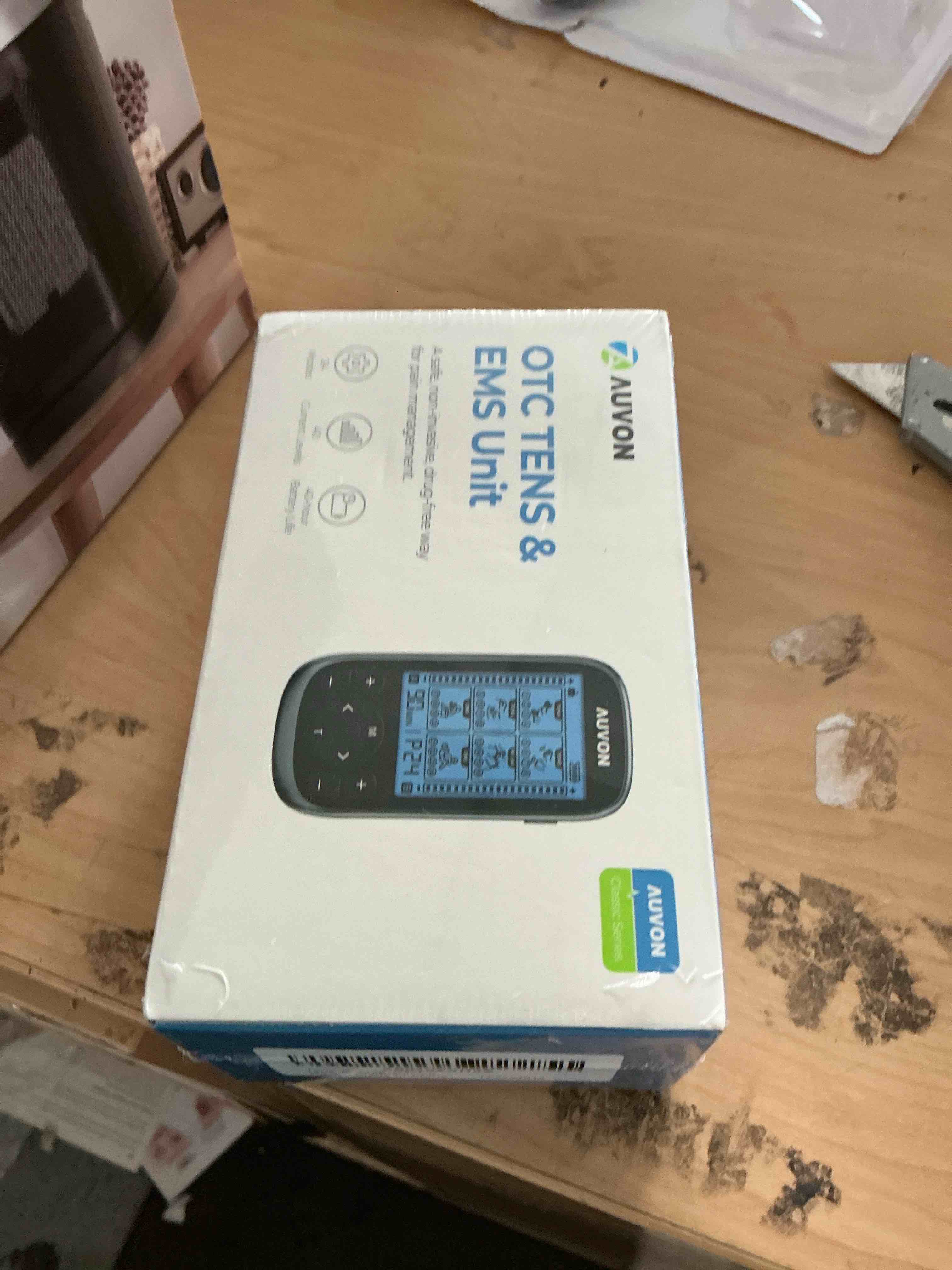 Condition photo showing New/Like New for auvon 3-in-1 tens unit muscle stimulator, ems massage machine with 40 intensities for gradual shoulder, sciatica, back pain relief, 24 modes rechargeable electronic pulse massager with 12 tens pads