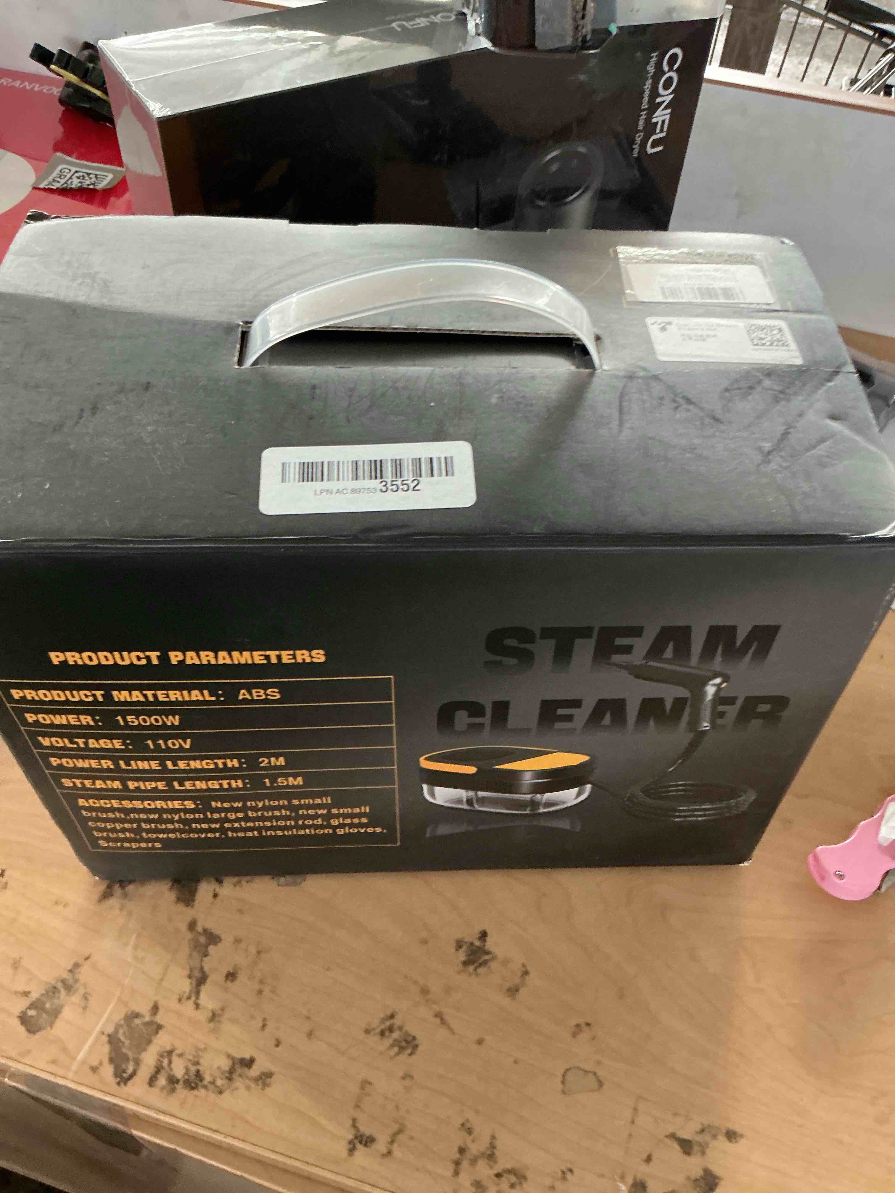 Condition photo showing New/Like New for gautye steam cleaner, 3 level adjustable handle with 18 accessories, black
