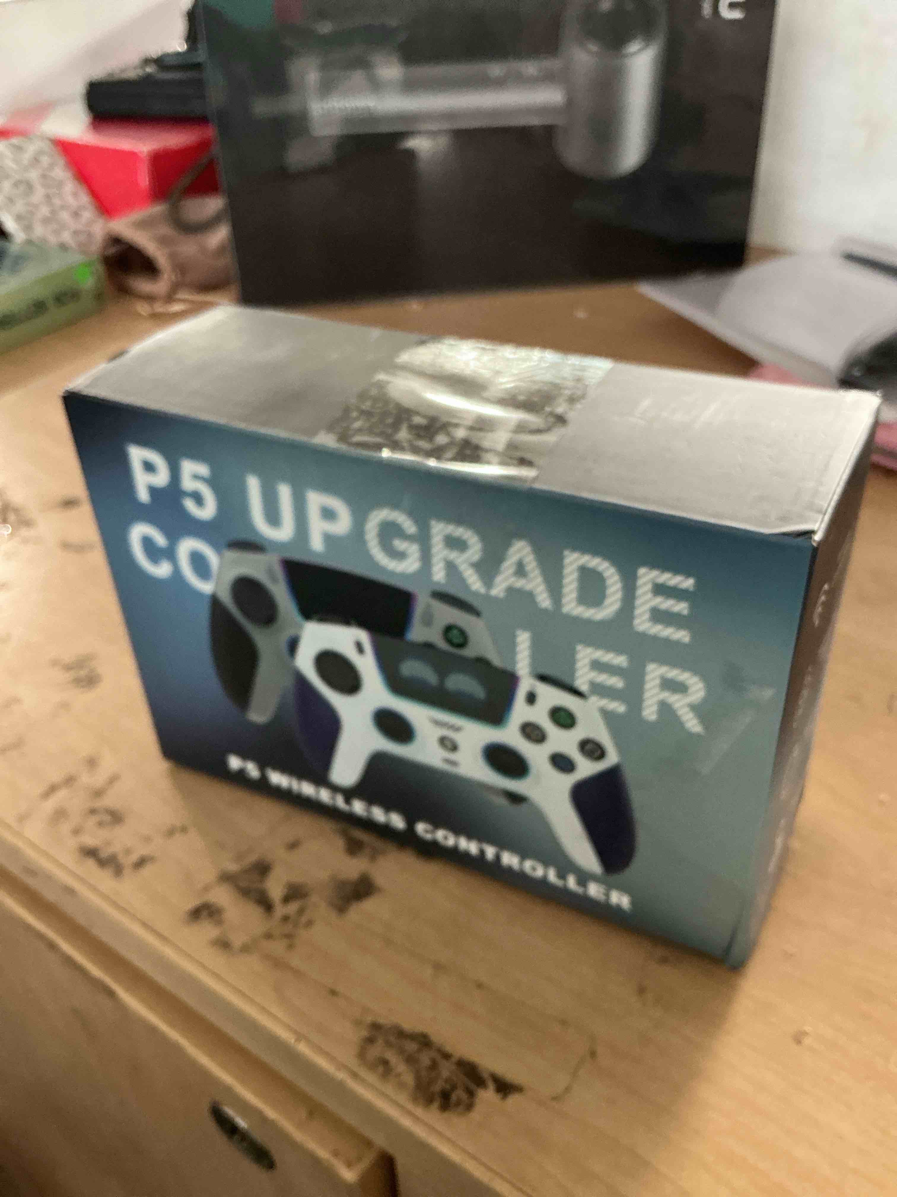 Condition photo showing New/Like New for sfgsup wireless pro controller for ps5, pc, mac, steam deck, blue-white