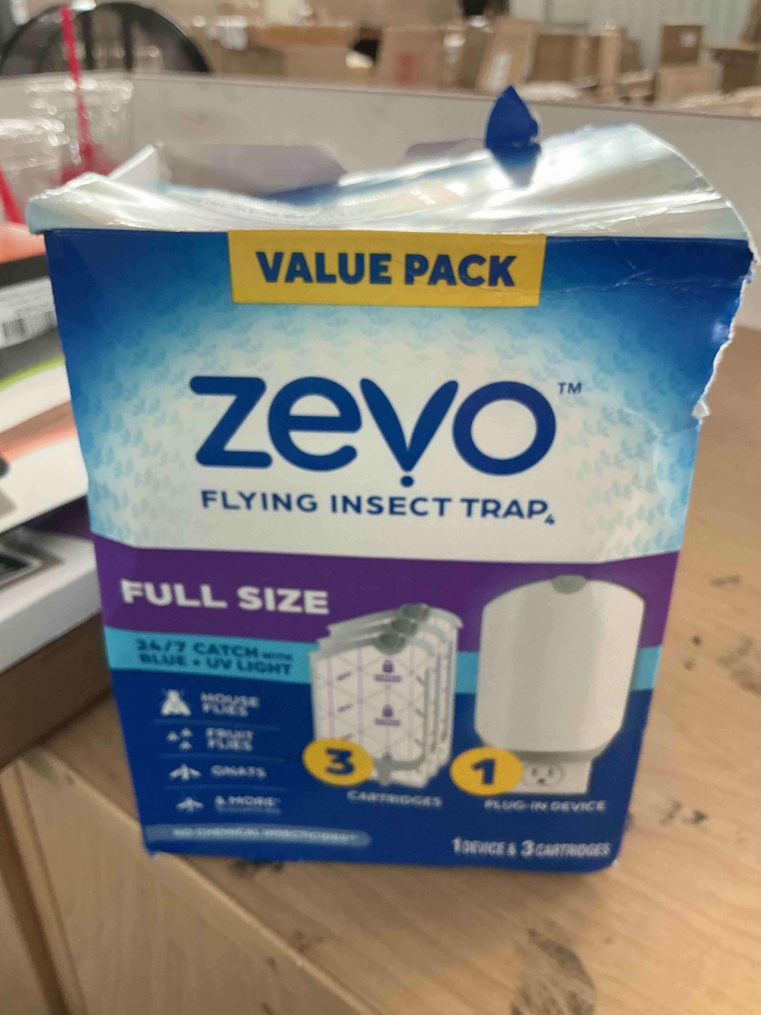 Condition photo showing New/Like New for zevo flying insect trap - plug-in indoor fly trap and bug light trap refill with blue and uv light - no-mess cartridge for house flies, fruit fly trap and gnats (1 plug-in base and 3 cartridges)