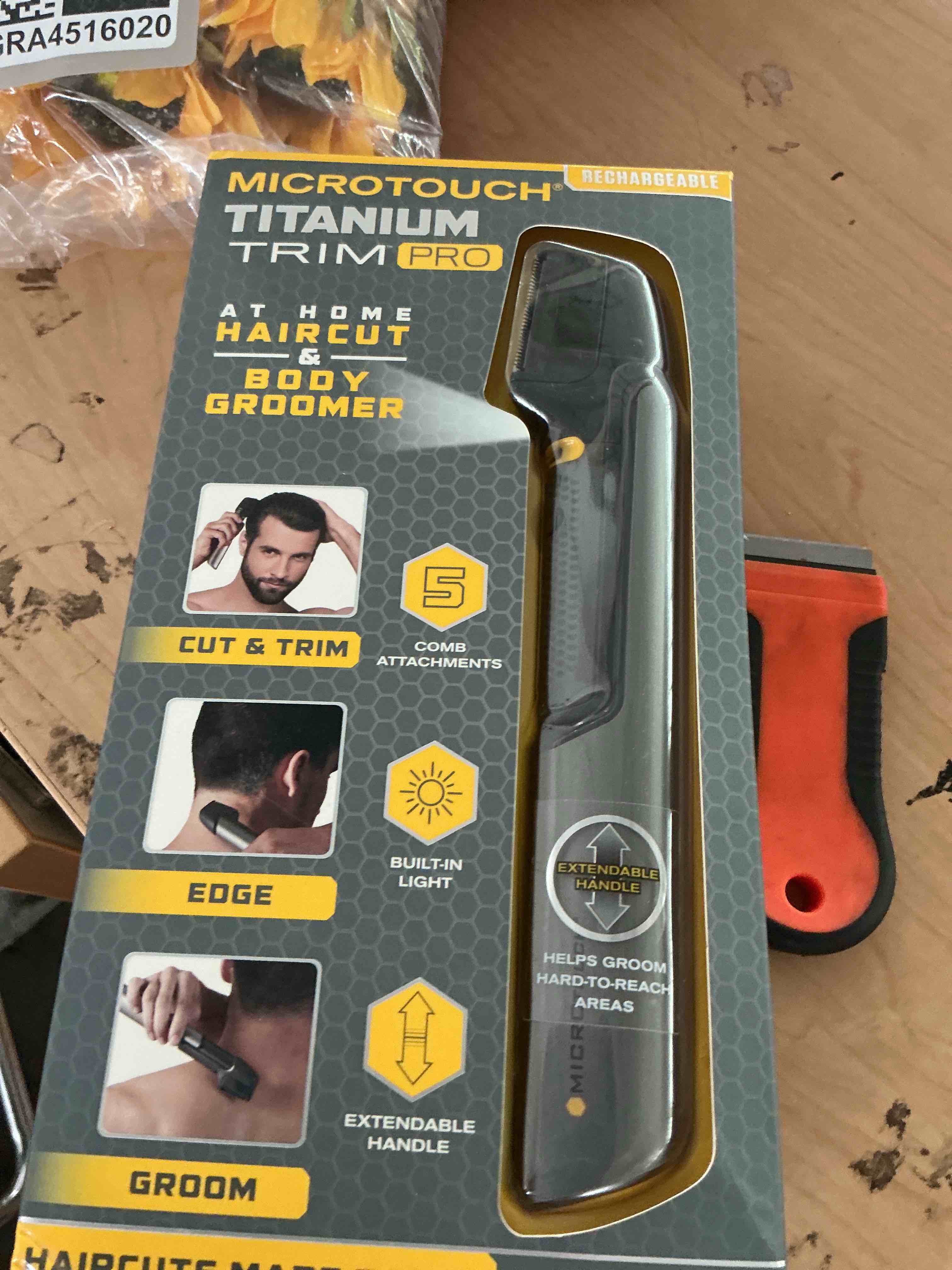 Condition photo showing New/Like New for microtouch trim pro, rechargeable lighted hair cutting tool and body groomer, black