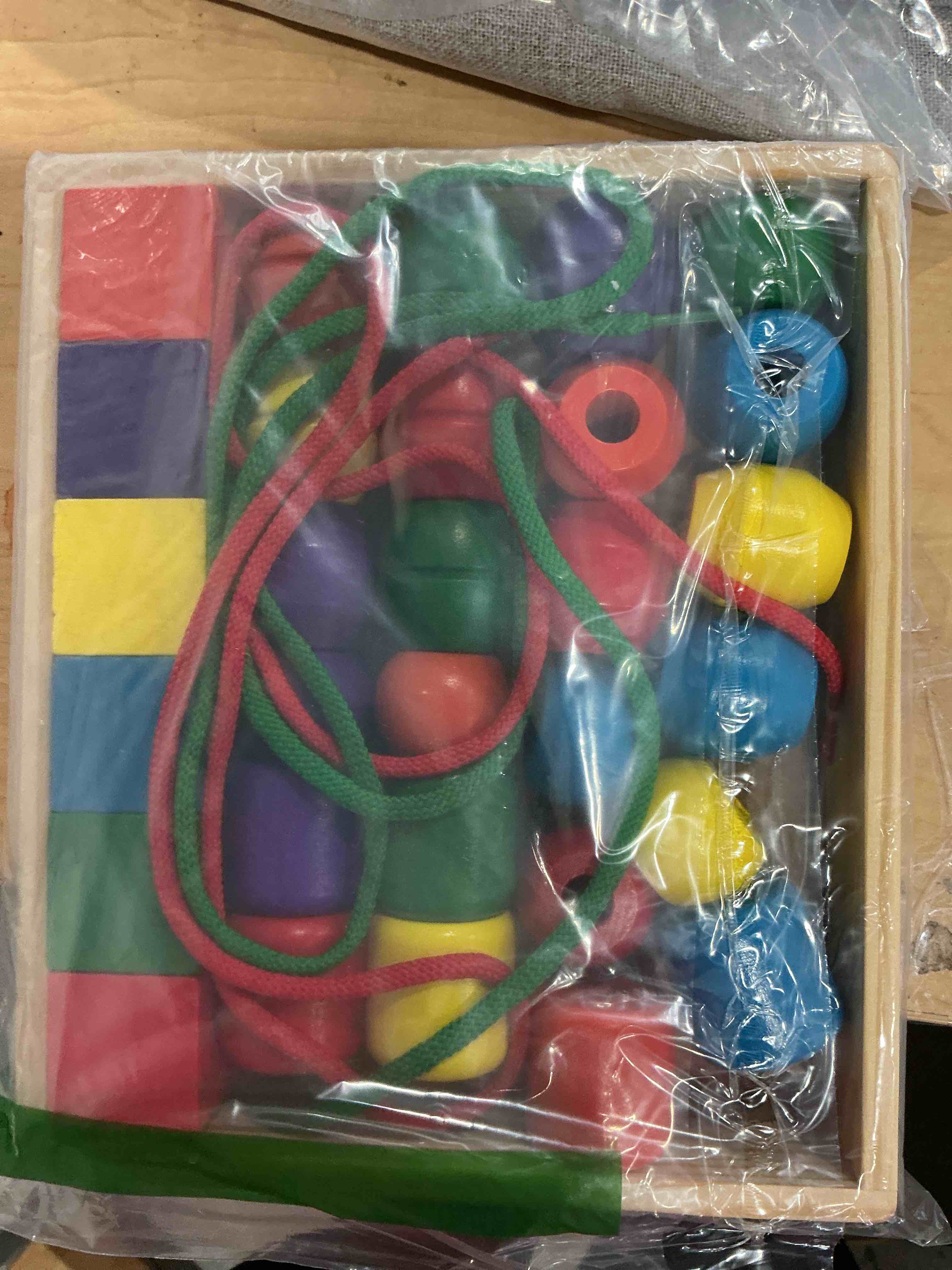 Condition photo showing Good Condition for melissa & doug primary lacing beads - educational toy with 30 wooden beads and 2 laces