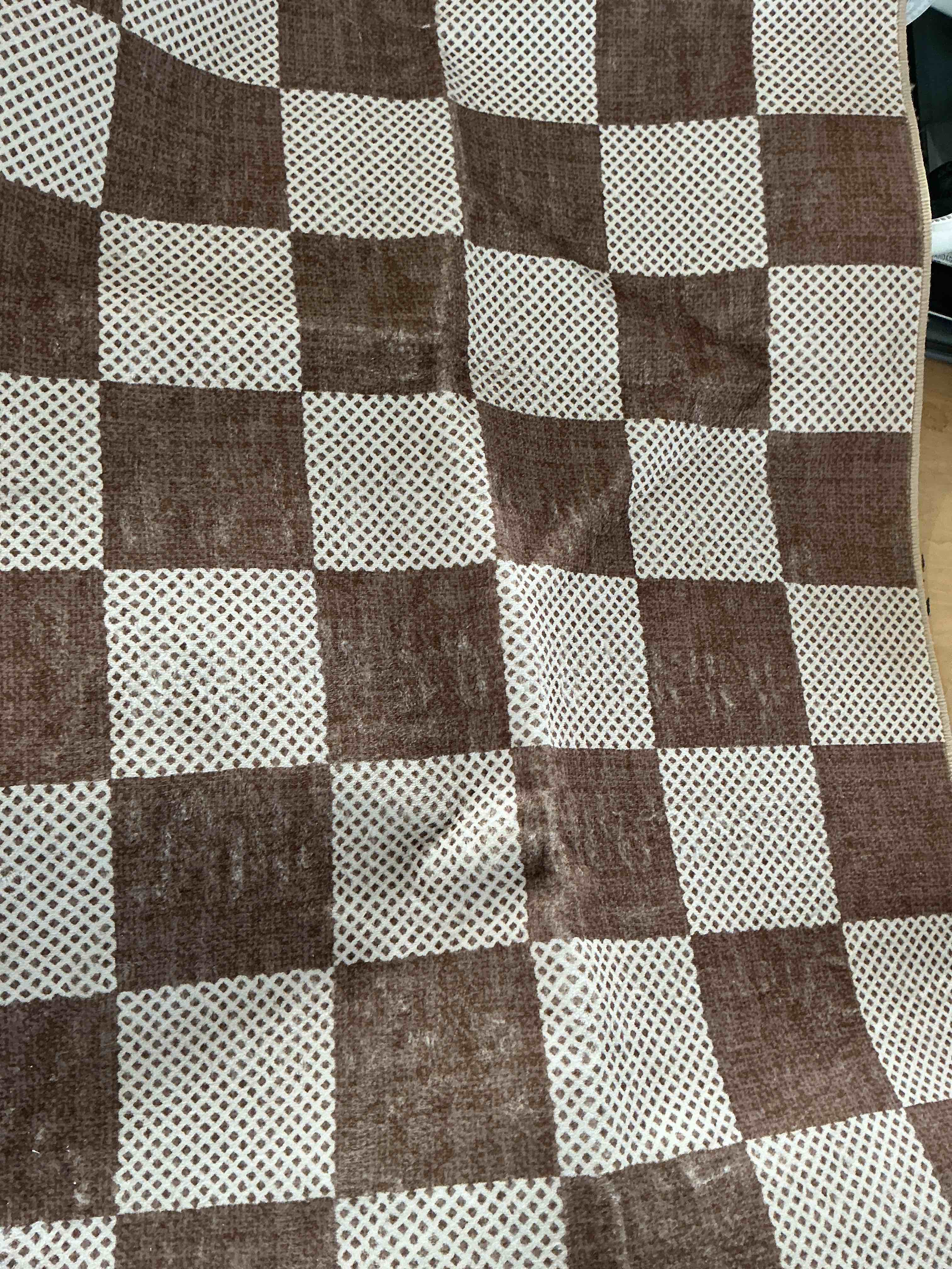 Condition photo showing New/Like New for front door rug - 2x3 brown beige checkered diamond entry rug
