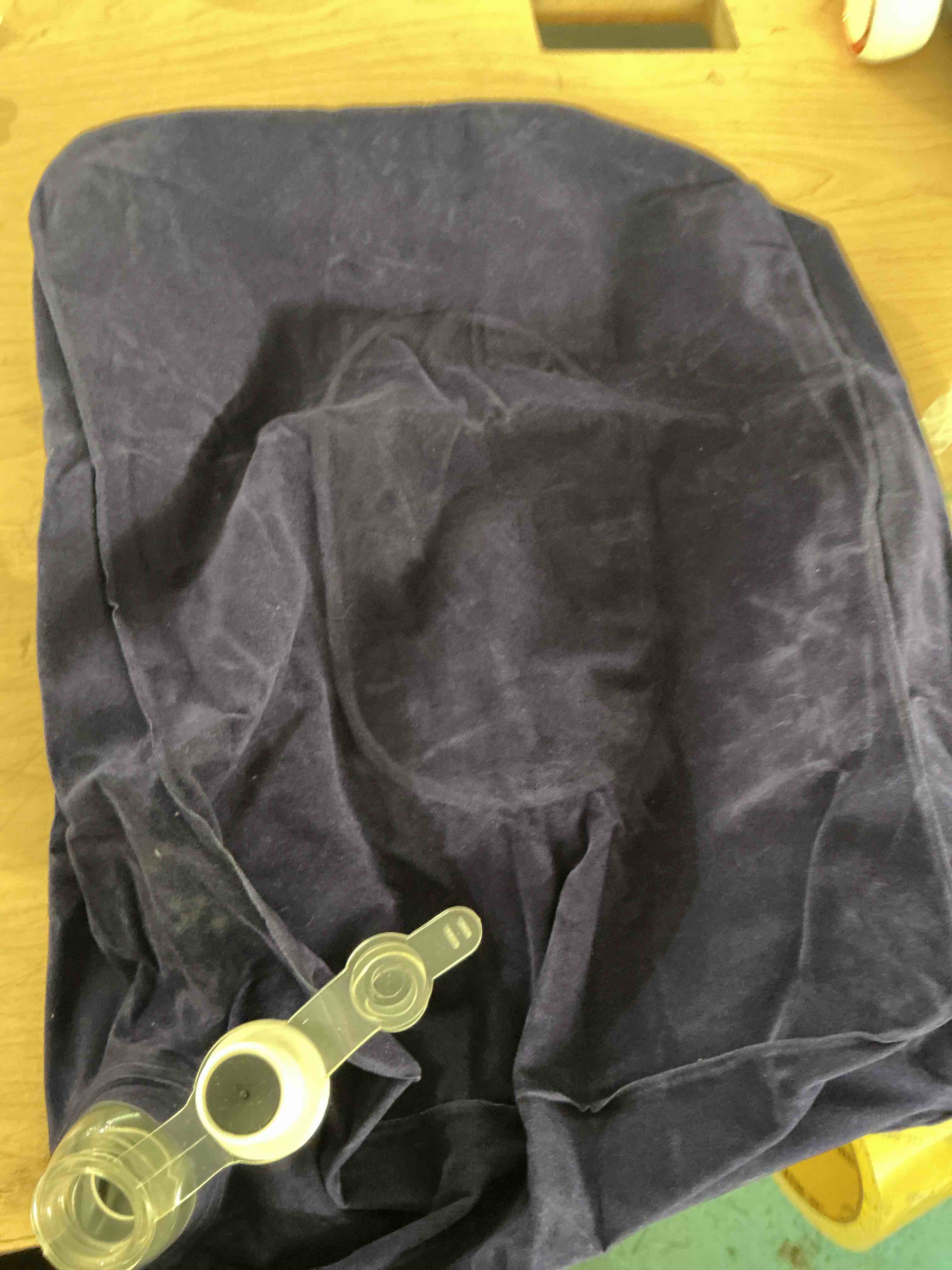 Condition photo showing New/Like New for inflatable travel pillow, inflatable travel foot rest pillow, leg rest pillow for cars, home, office, trains, airplane, blue