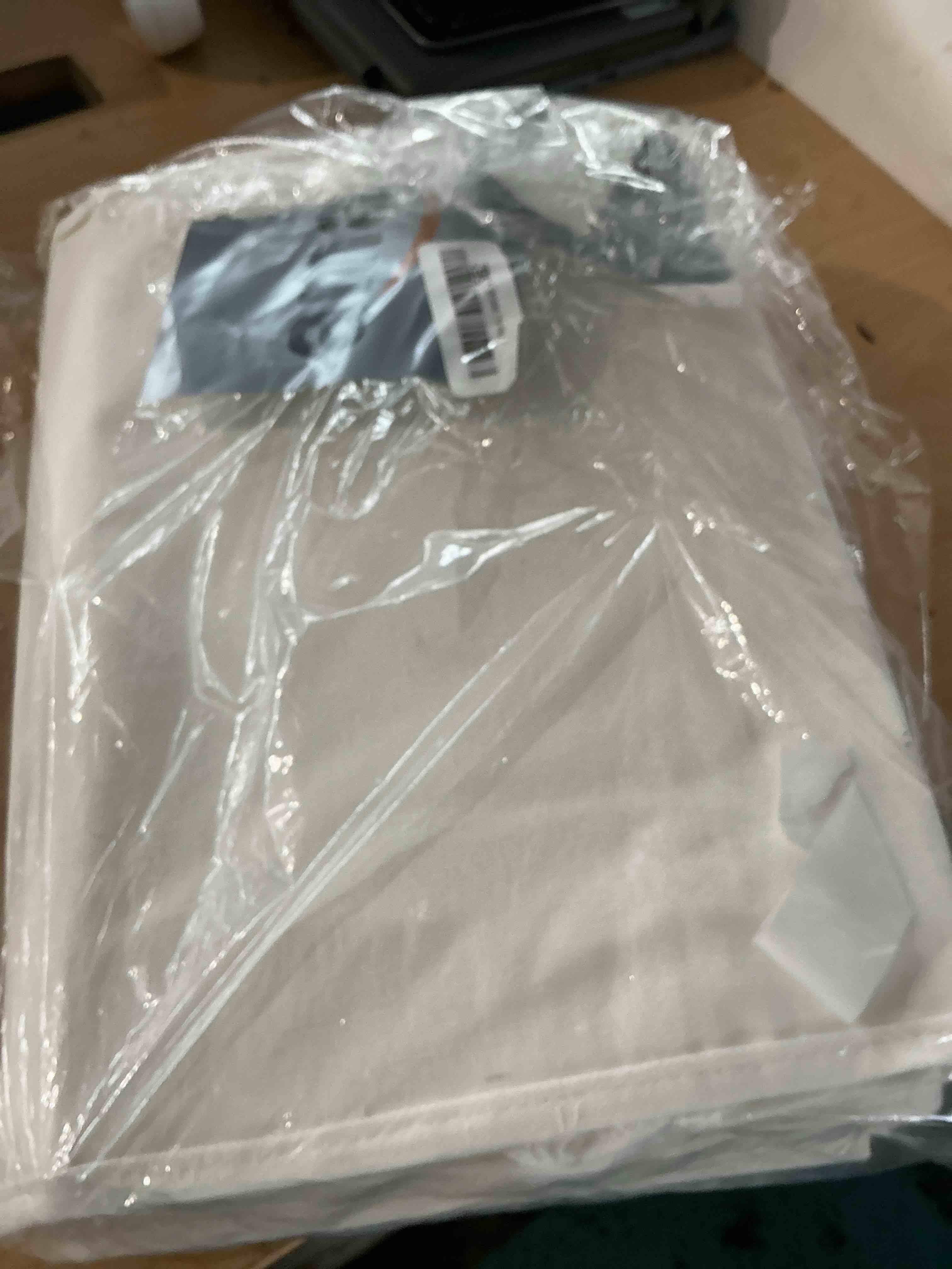 Condition photo showing New/Like New for dahey over the door organizer 5 pockets hanging behind door storage, white