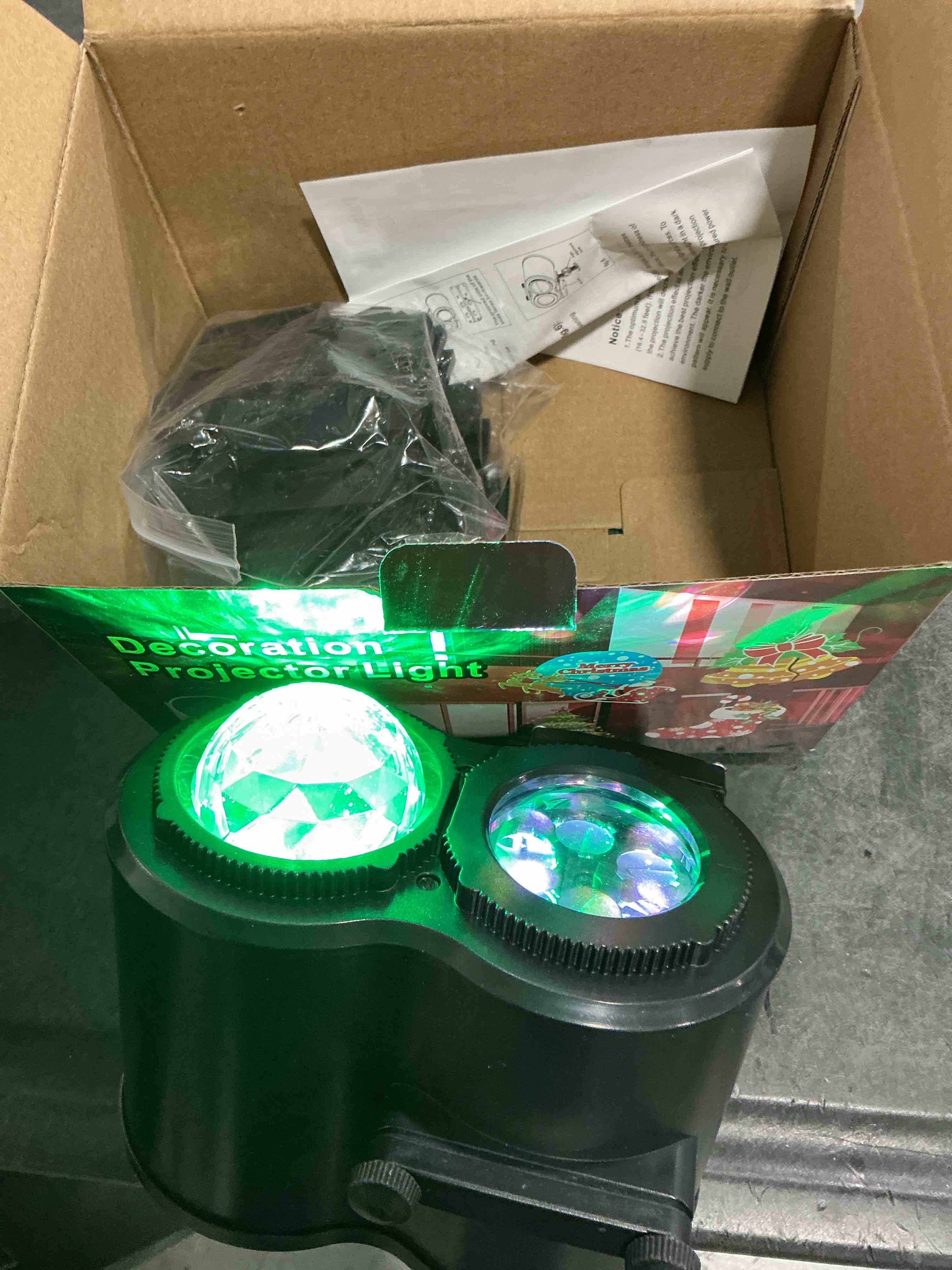 Condition photo showing Good Condition for 4-Large Pattern Halloween Christmas Projector Lights Outdoor, 29 Effects Holiday Projector Light Outdoor 2 in 1 with Remote, Christmas Decorations Lighting for Outside Home Party House Decor