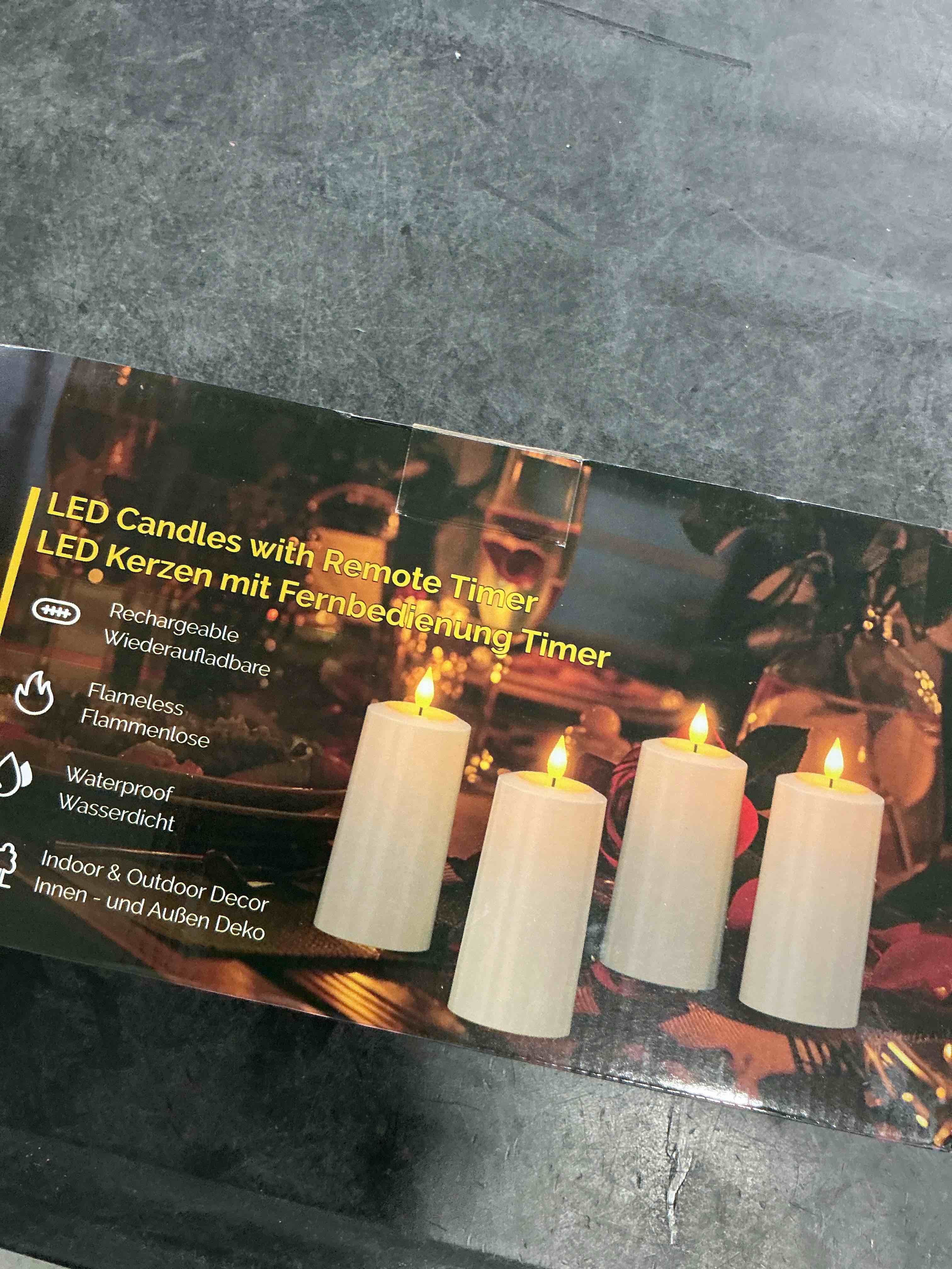 Condition photo showing Good Condition for SoulBay Flameless LED Candles, 4-Pack USB Rechargeable, Flickering Waterproof White Pillar Candles with Remote Control Timer for Outdoor Lantern Patio Yard Indoor Holiday Decor, 2.75 x 5.1 Inches