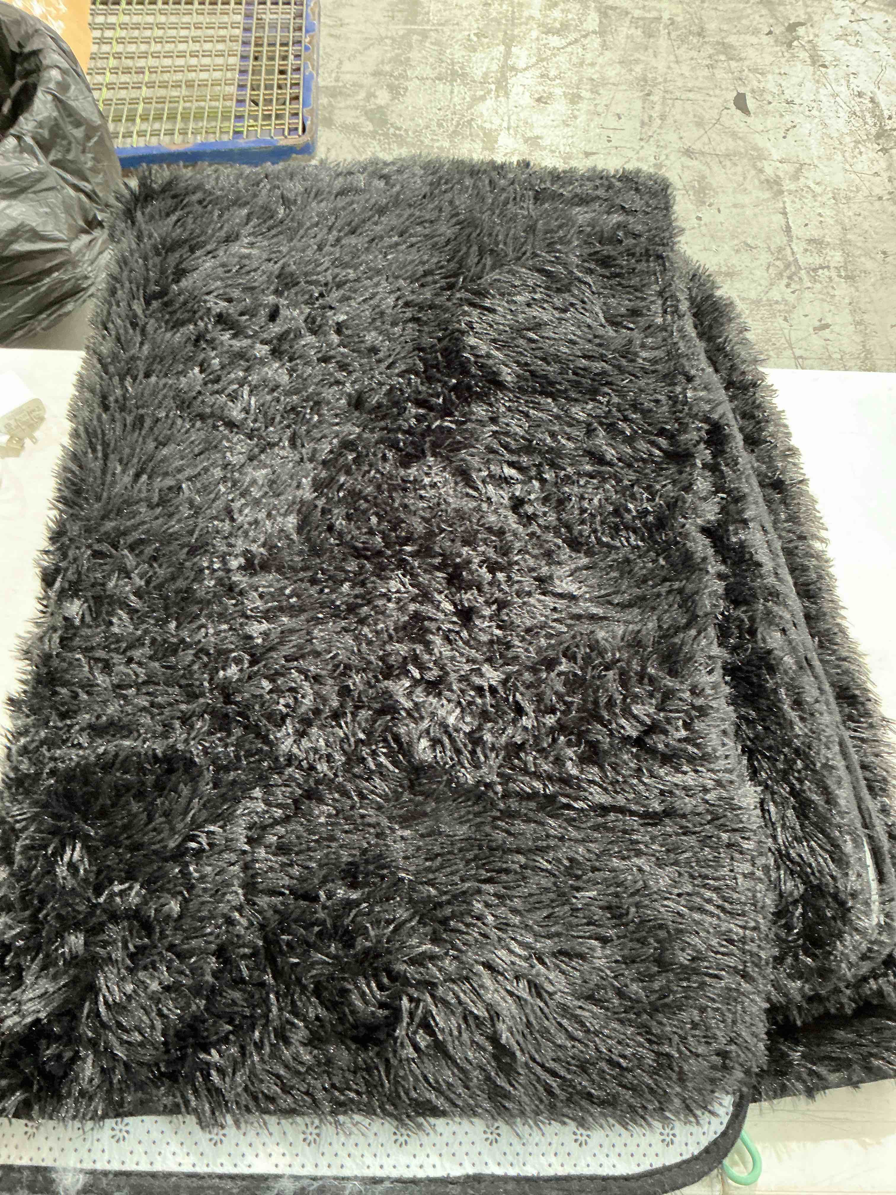 Condition photo showing Good Condition for TWINNIS Super Soft Shaggy Rugs Fluffy Carpets,5x7 Feet, Indoor Modern Plush Area Rugs for Living Room Bedroom Kids Room Nursery Home Decor, Upgrade Anti-Skid Rectangular Fuzzy Rug, Black