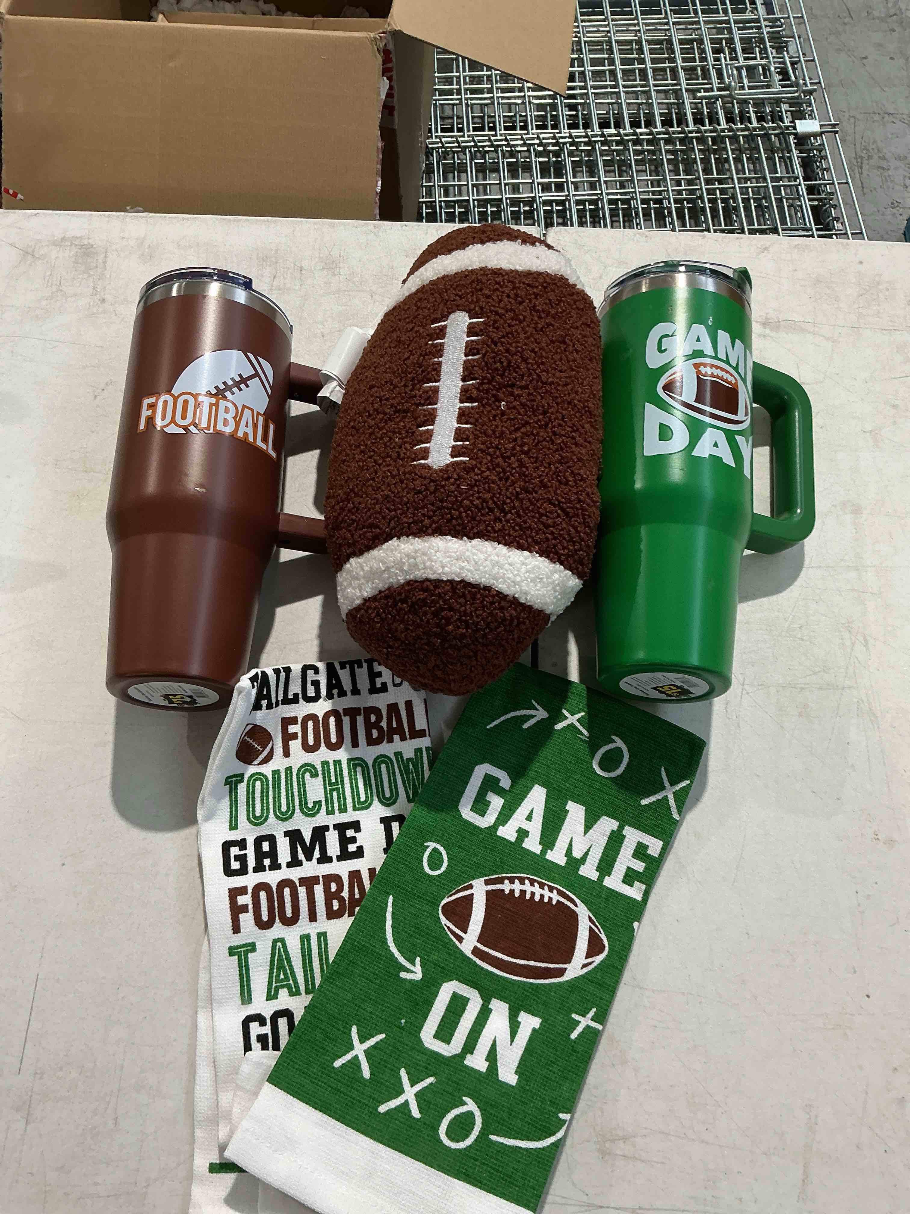 Game day. 40 ounce cups, plus football and towels.
