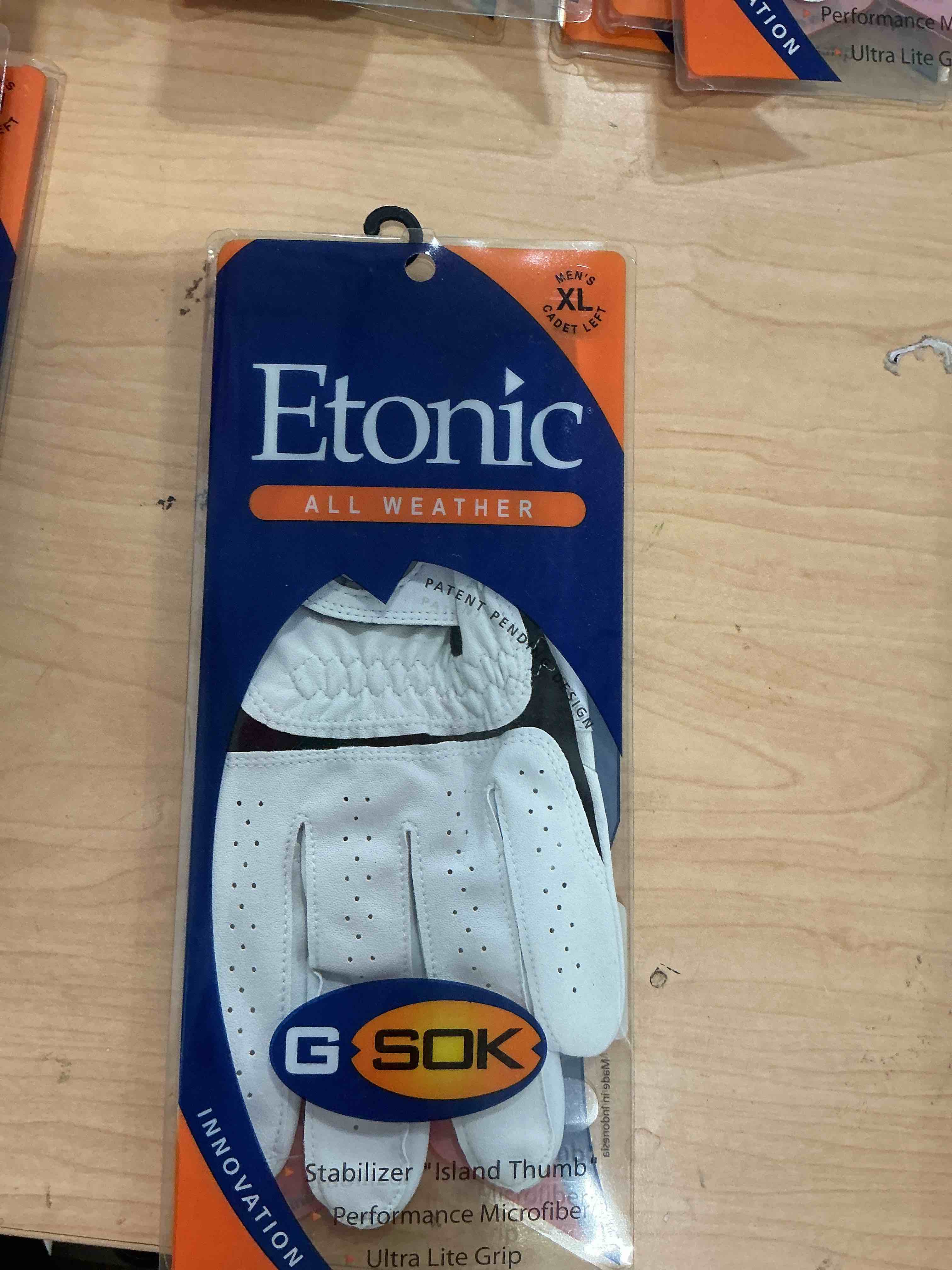 Condition photo showing New/Like New for etonic all weather golf glove white/black reg lh m