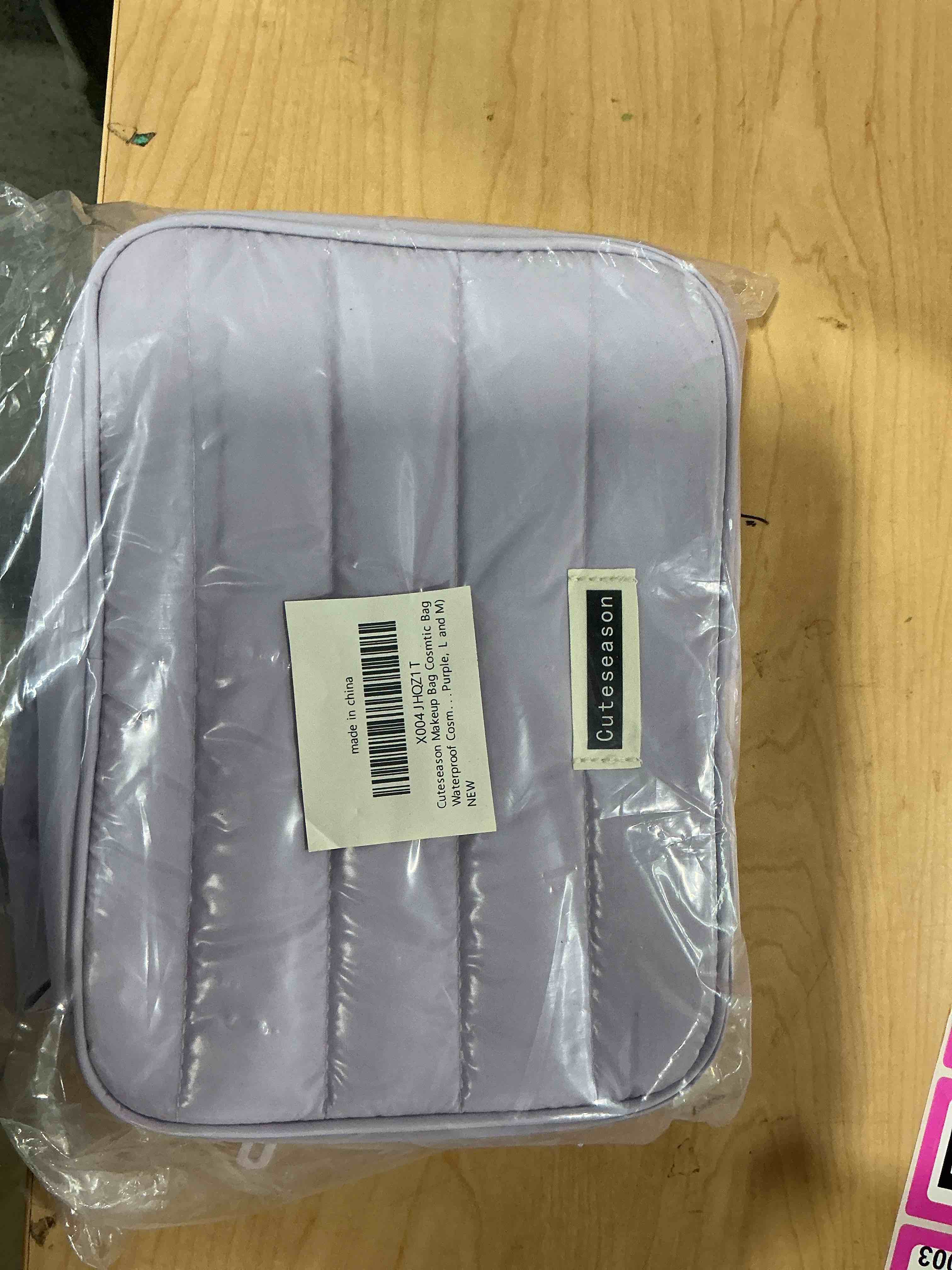 Condition photo showing New/Like New for puffy quilted silver makeup bag for women, large waterproof cosmetic bag with compartments, travel toiletry organizer pouch(purple, l and m)