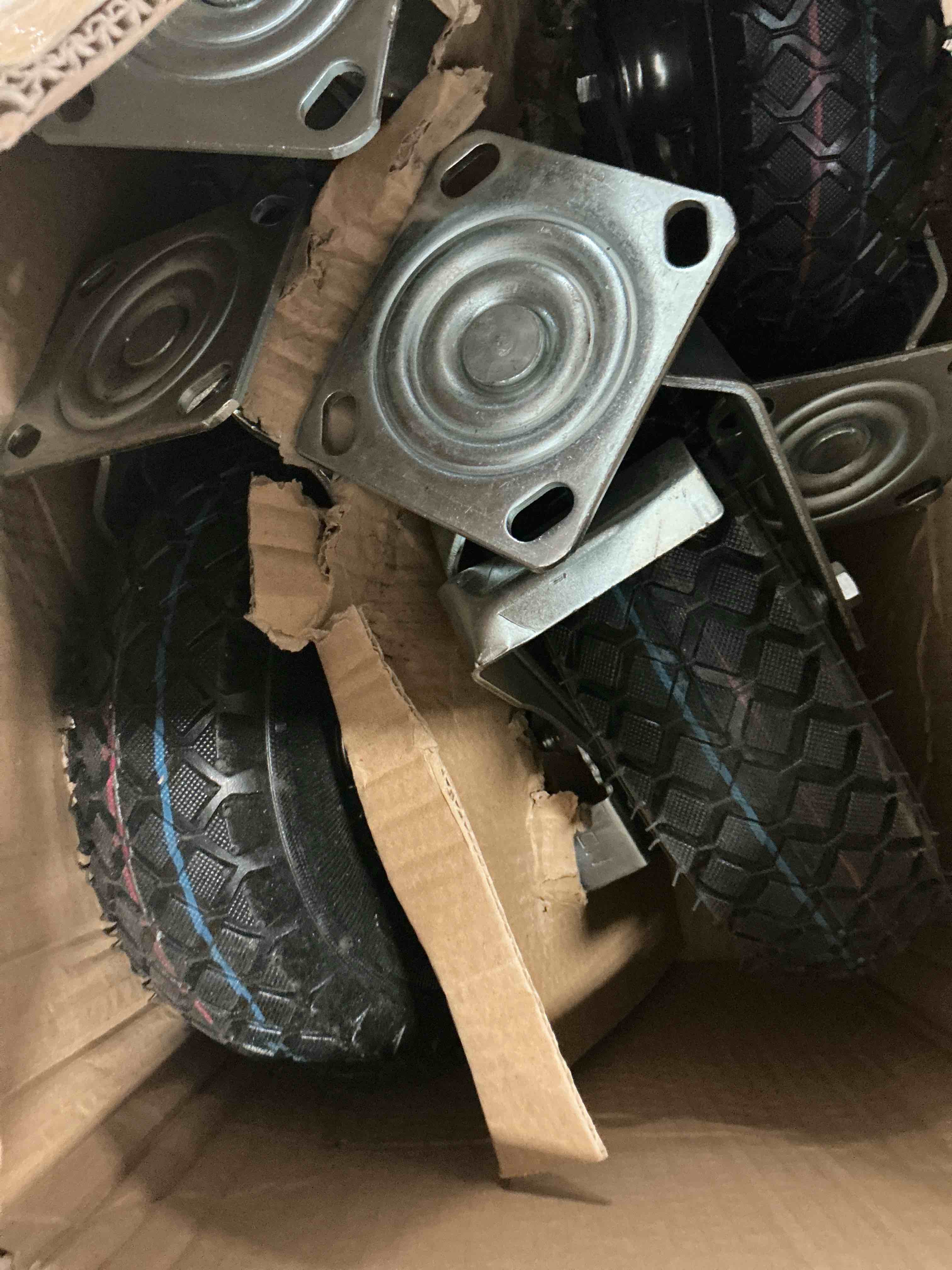 Condition photo showing New/Like New for 10 inch pneumatic casters set of 4 (2 swivel/2 rigid),heavy duty casters,tolerable 1300 lbs,rubber knobby tread for workbench, cart, trolley,wagon and shelves