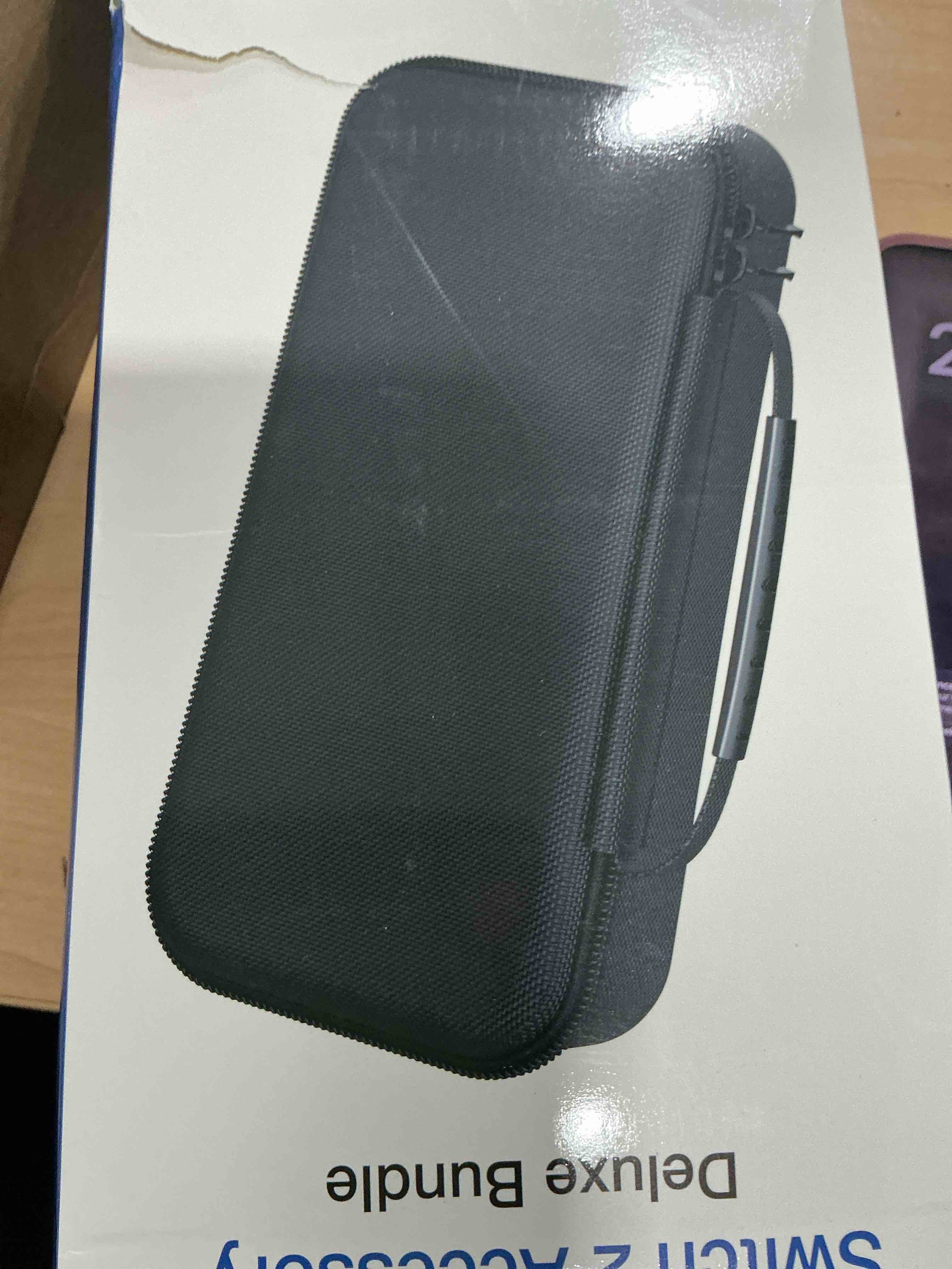 Condition photo showing New/Like New for heystop carrying case for nintendo switch 2,portable travel case for nintendo switch 2 accessories with screen protector*1,protective cover*1,thumb caps*6,large space with 12 game card slot,hard shell