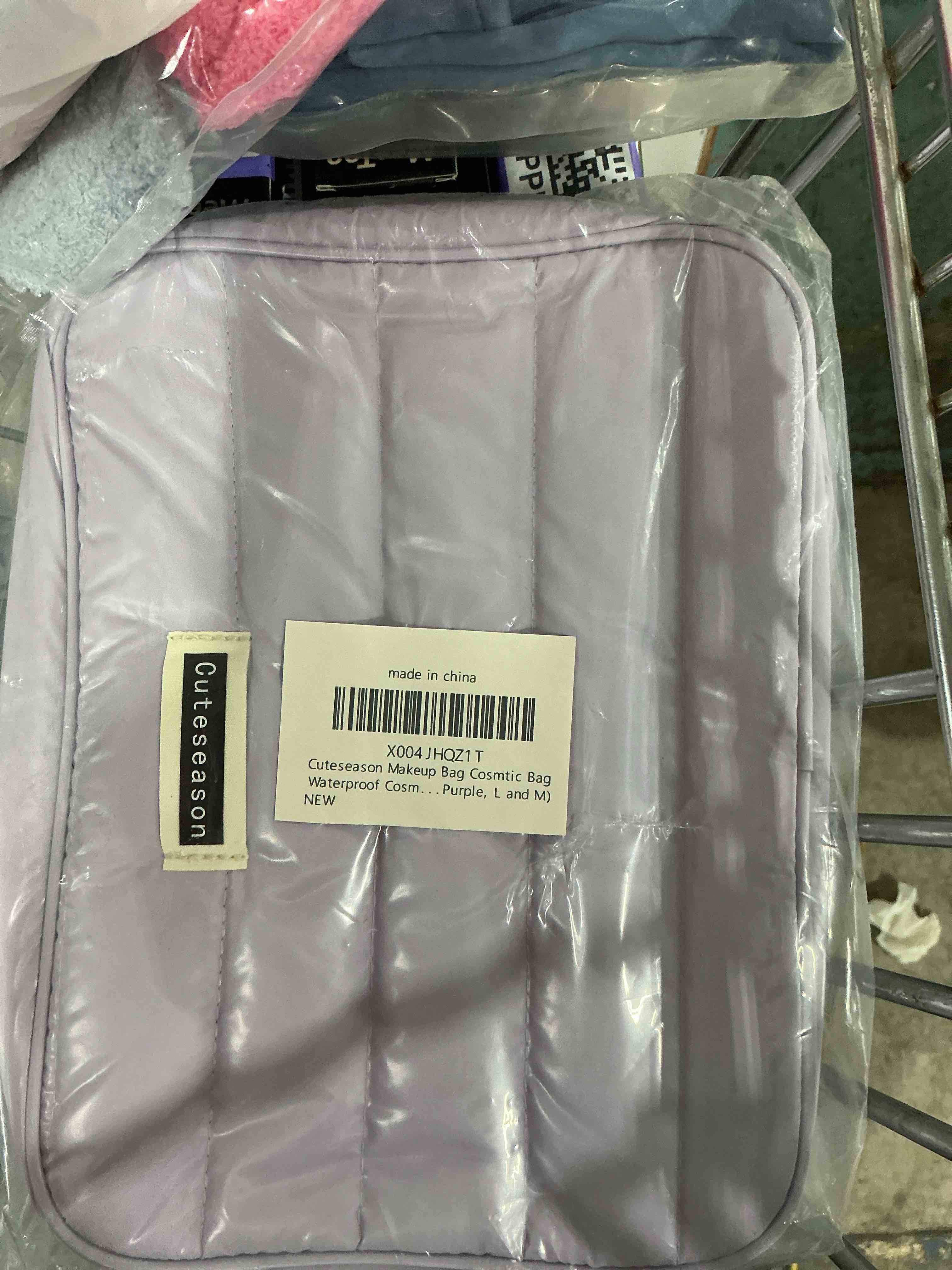 Condition photo showing New/Like New for puffy quilted silver makeup bag for women, large waterproof cosmetic bag with compartments, travel toiletry organizer pouch(purple, l and m)