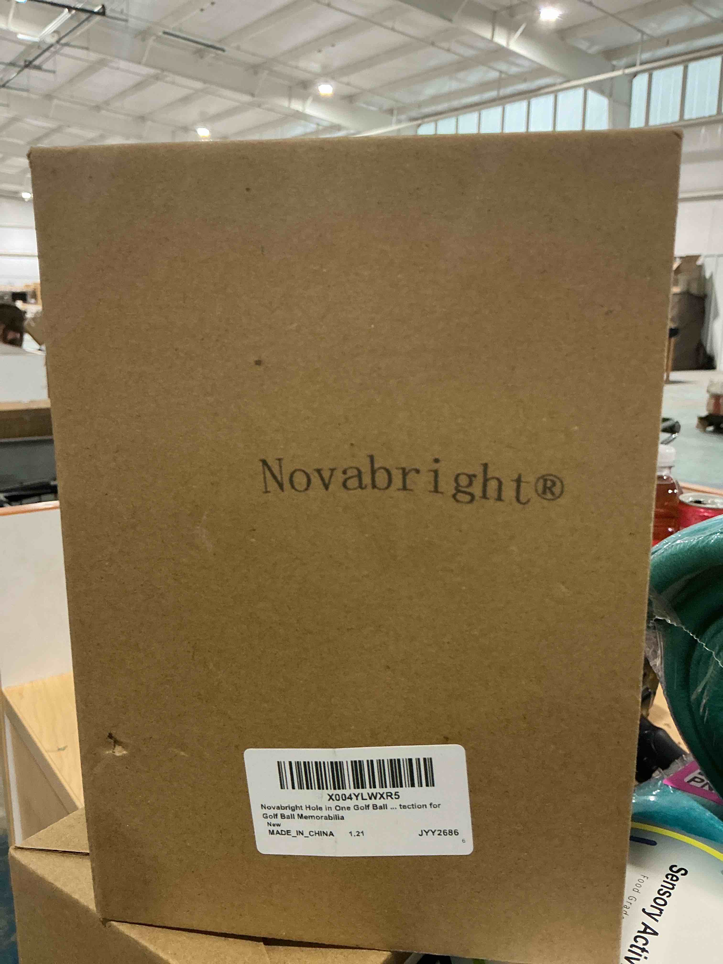 Condition photo showing New/Like New for golf ball display case for hole-in-one golfer. black ball throne with golden stamp. 2x background frames on each side of cambered cover. pencil holder, adhesive dots all included, no assembly