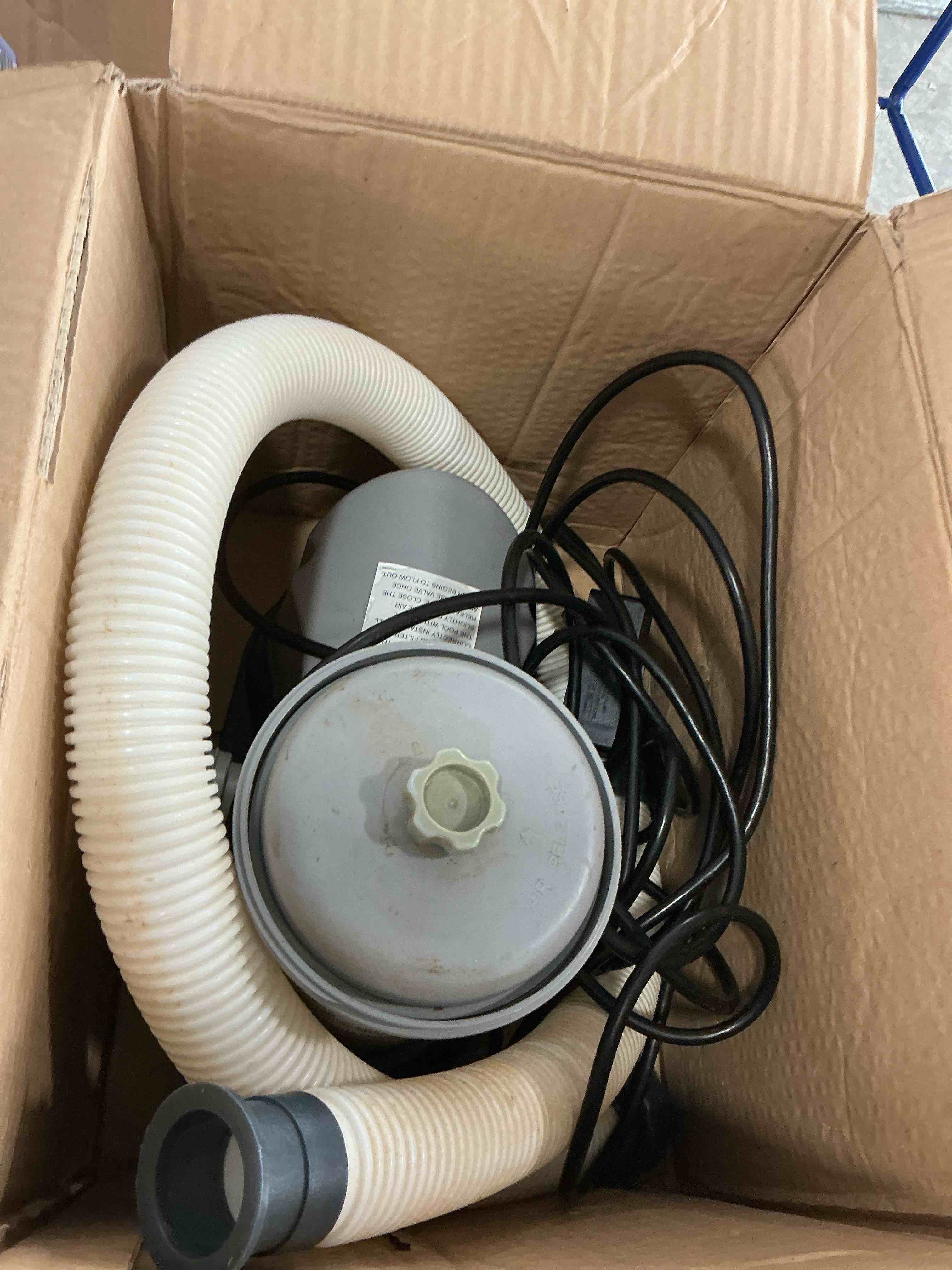 Condition photo showing As Is for bestway 58390e flowclear 1500 gph filter pump for 300 to 8,400 gallon above ground swimming pool with adaptors and energy saving plug