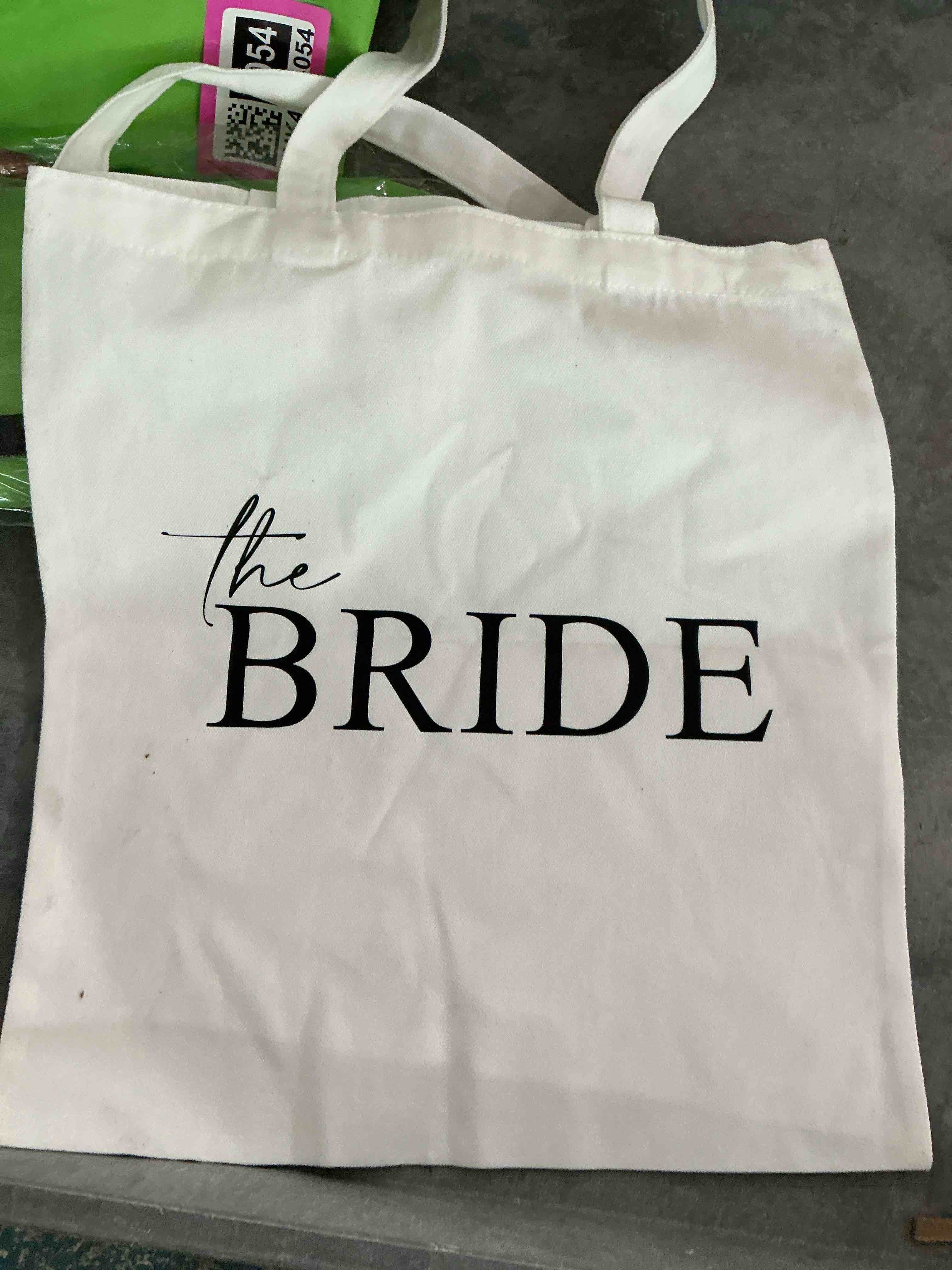 Condition photo showing New/Like New for the bride canvas tote bag, wedding party bridesmaid gift, cute bridal squad reusable shopper, perfect for bachelorette parties & wedding prep. (068)