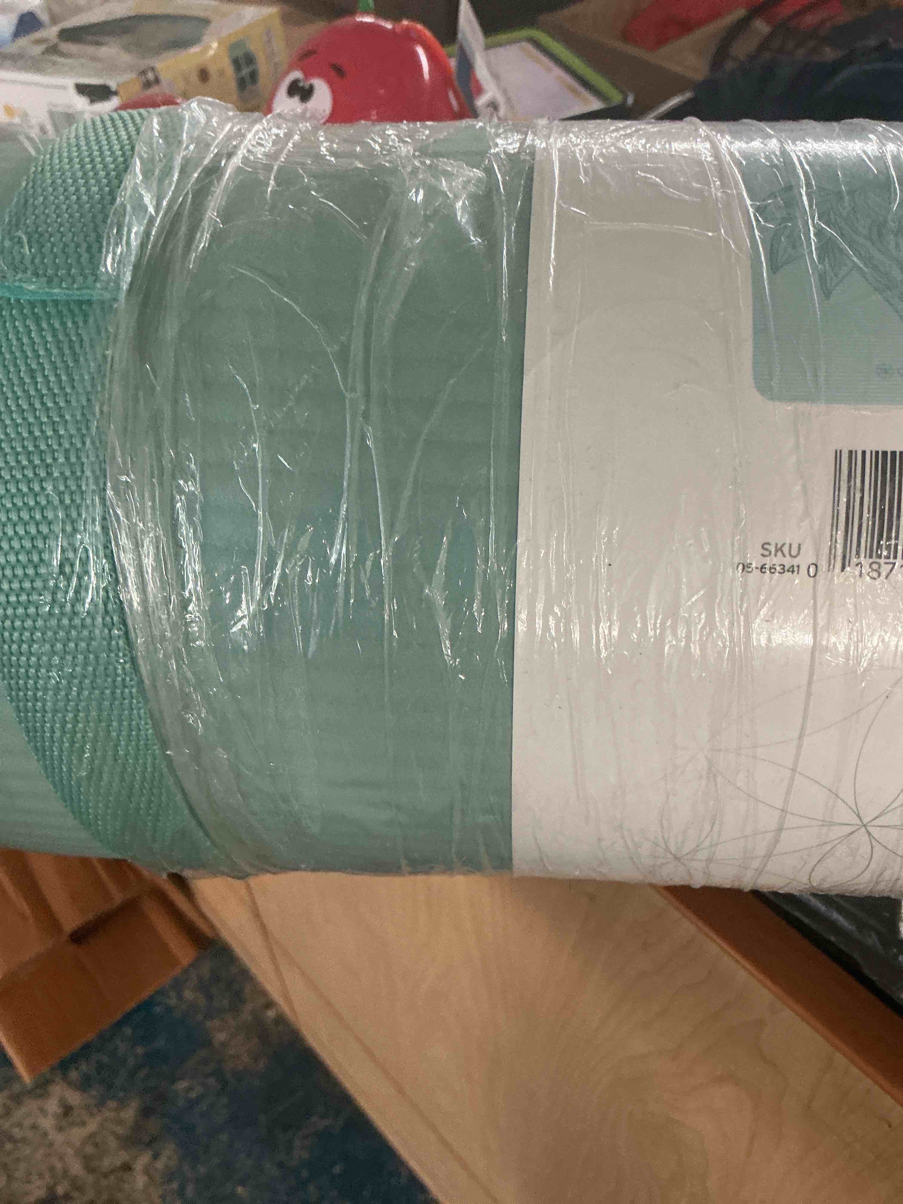 Condition photo showing New/Like New for gaiam yoga mat, pilates & exercise mat, thick 2/5" (10mm) workout mat with easy-cinch carrying strap for home & gym workouts  2/5" (10mm) teal