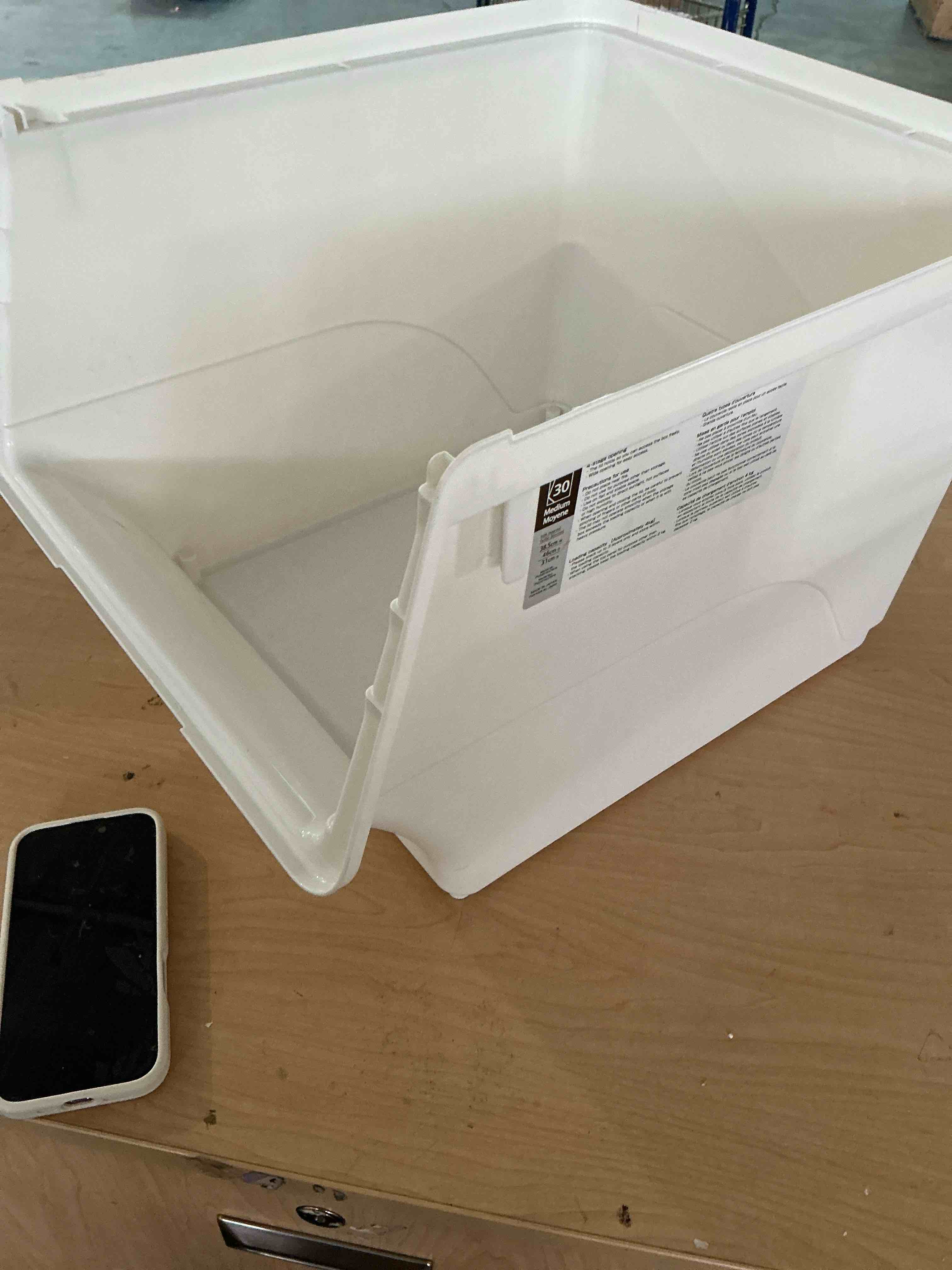 Condition photo showing New/Like New for white storage bin with a 30 liter capacity 