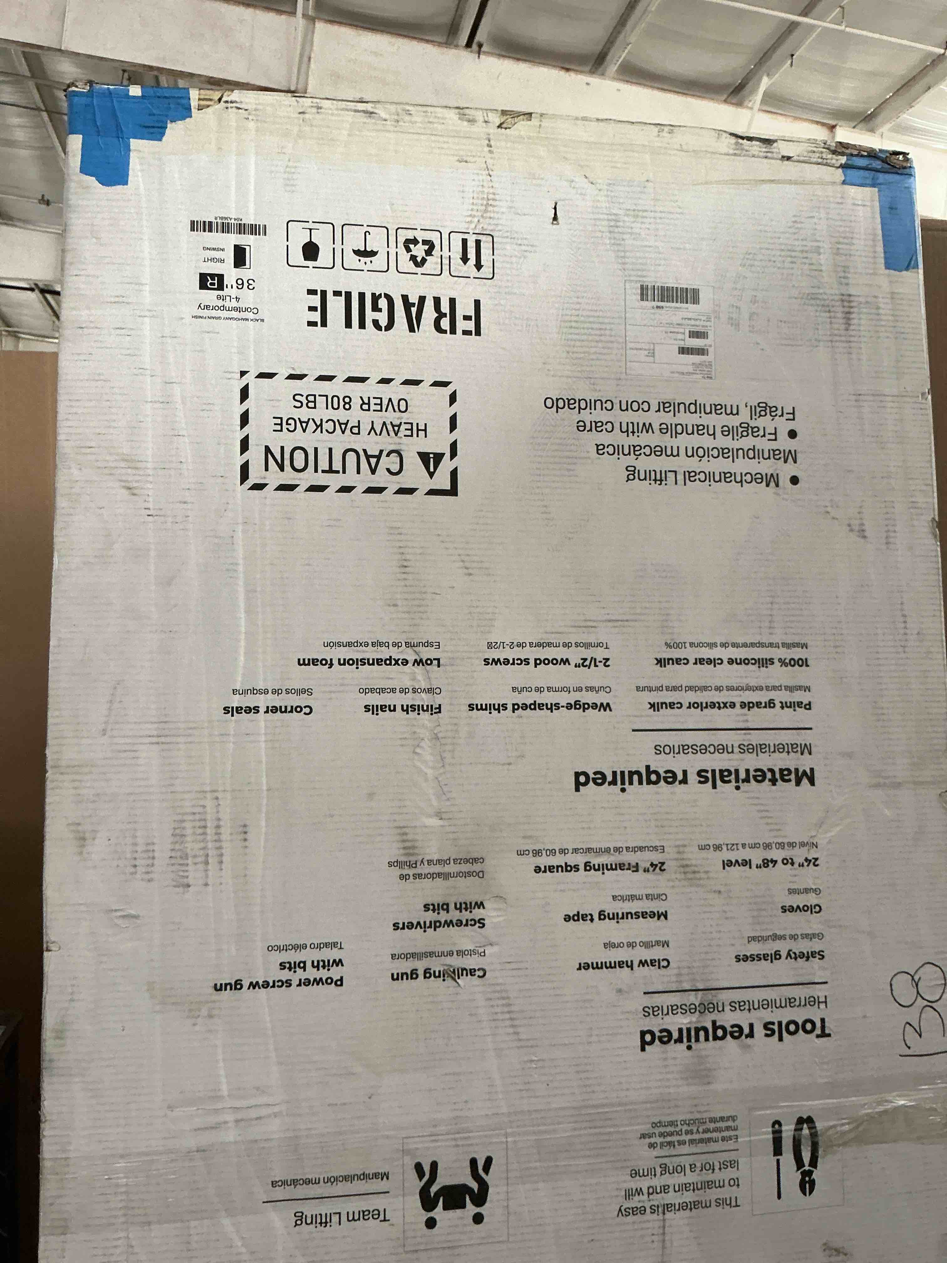 Condition photo showing New/Like New for 36x80in fiberglass door slab, actual slab size 35-3/4" x 79", black exterior door slab with pre-cut hinge mortises and lockset hole, left-hand inswing/outswing, woodgrain finish and 4 lite frost glass
