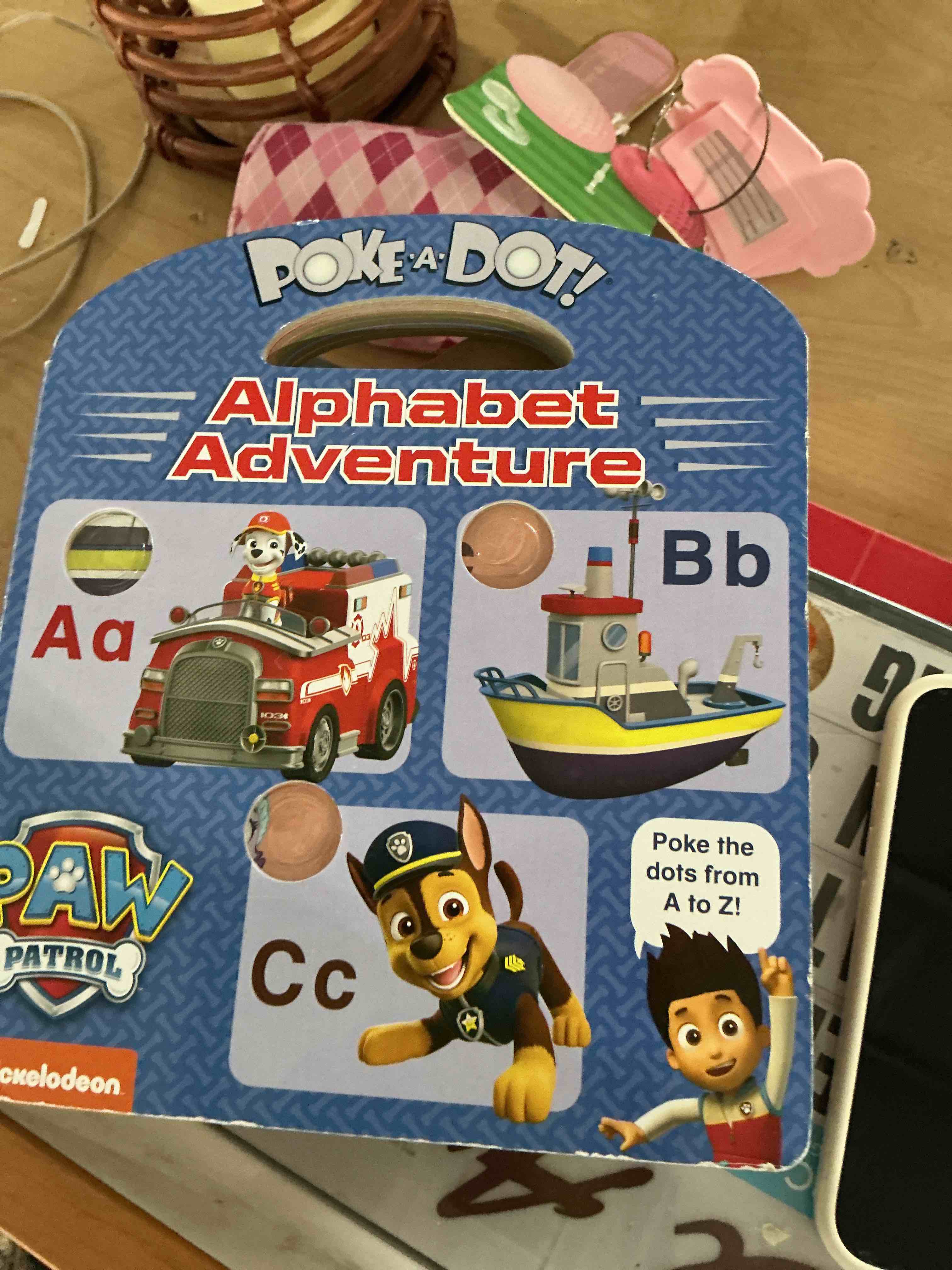 Condition photo showing New/Like New for melissa & doug paw patrol children's book - poke-a-dot: alphabet adventure