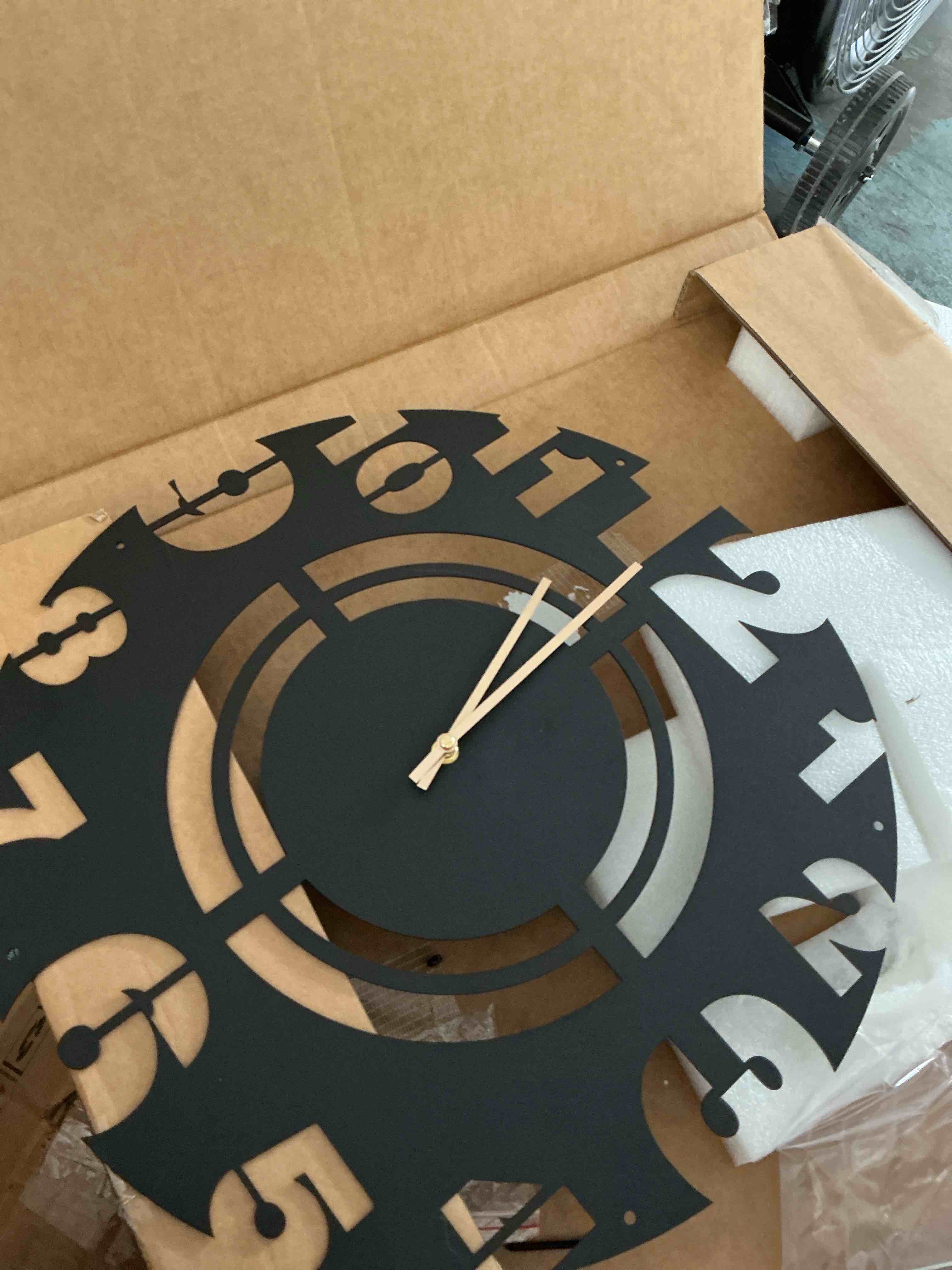Condition photo showing New/Like New for metal wall clock for home decor unique design