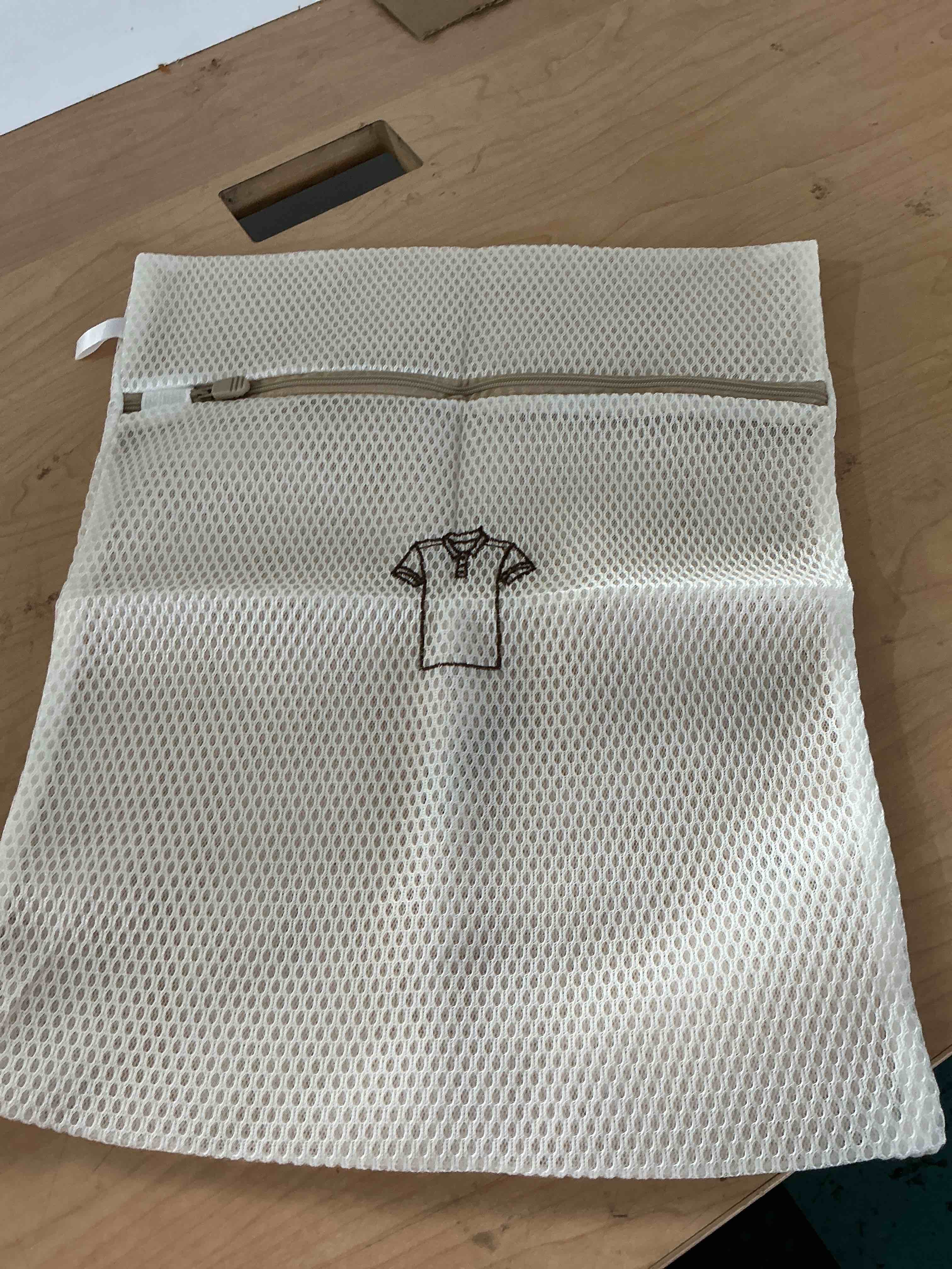 Condition photo showing New/Like New for laundry 360 medium mesh wash bag | laundry | washing machine | zipper closure | prevents pulling and tearing | clothes | garments | delicates | socks | white