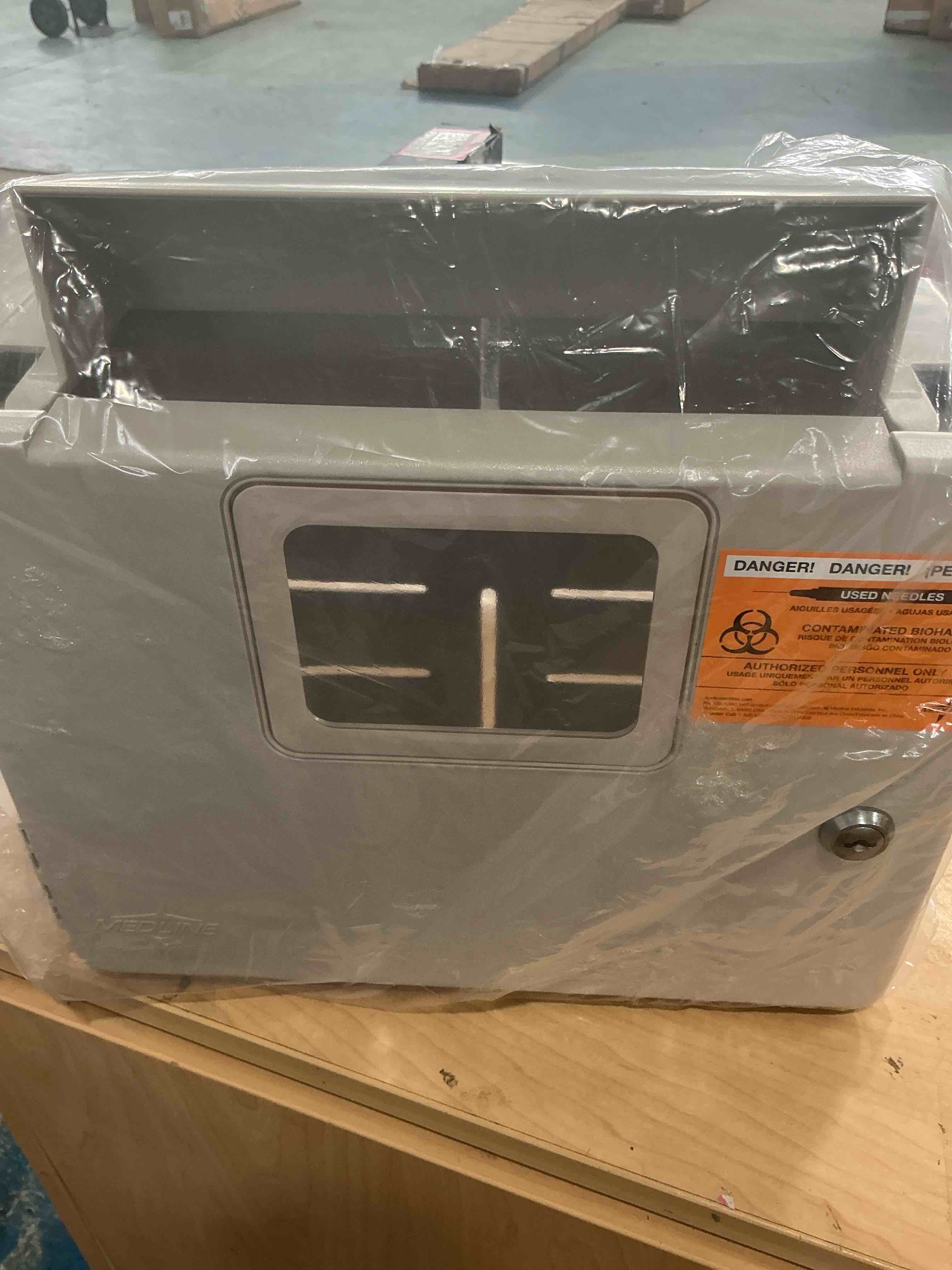Condition photo showing New/Like New for medline locking sharps container cabinet