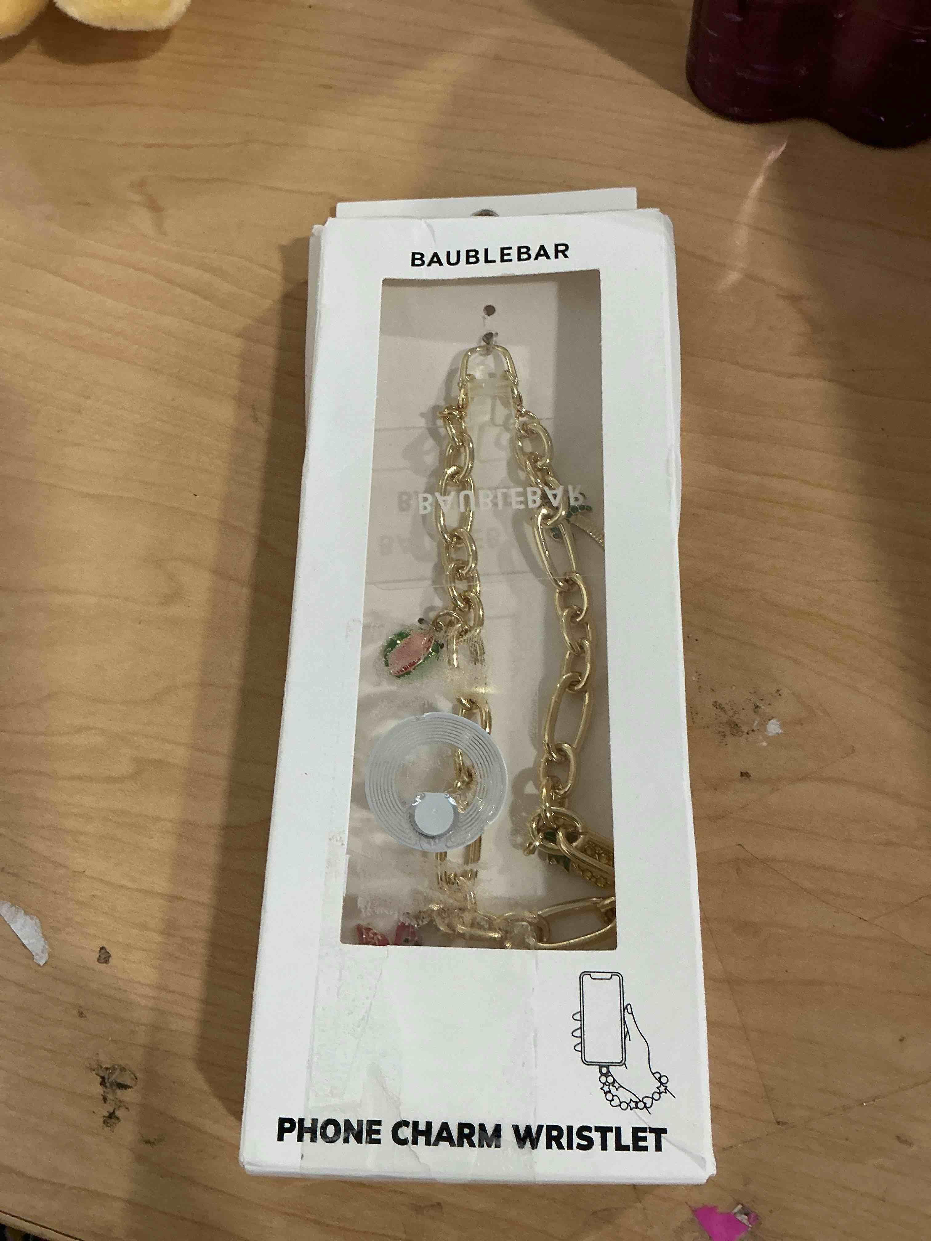 Condition photo showing New/Like New for baublebar charm wristlet