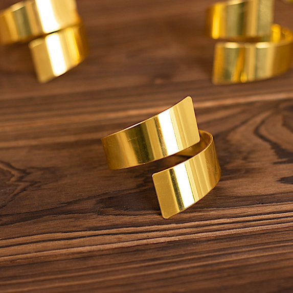 Condition photo showing New/Like New for balsa circle 4 gold swirl design metal napkin rings wedding party events reception decorations