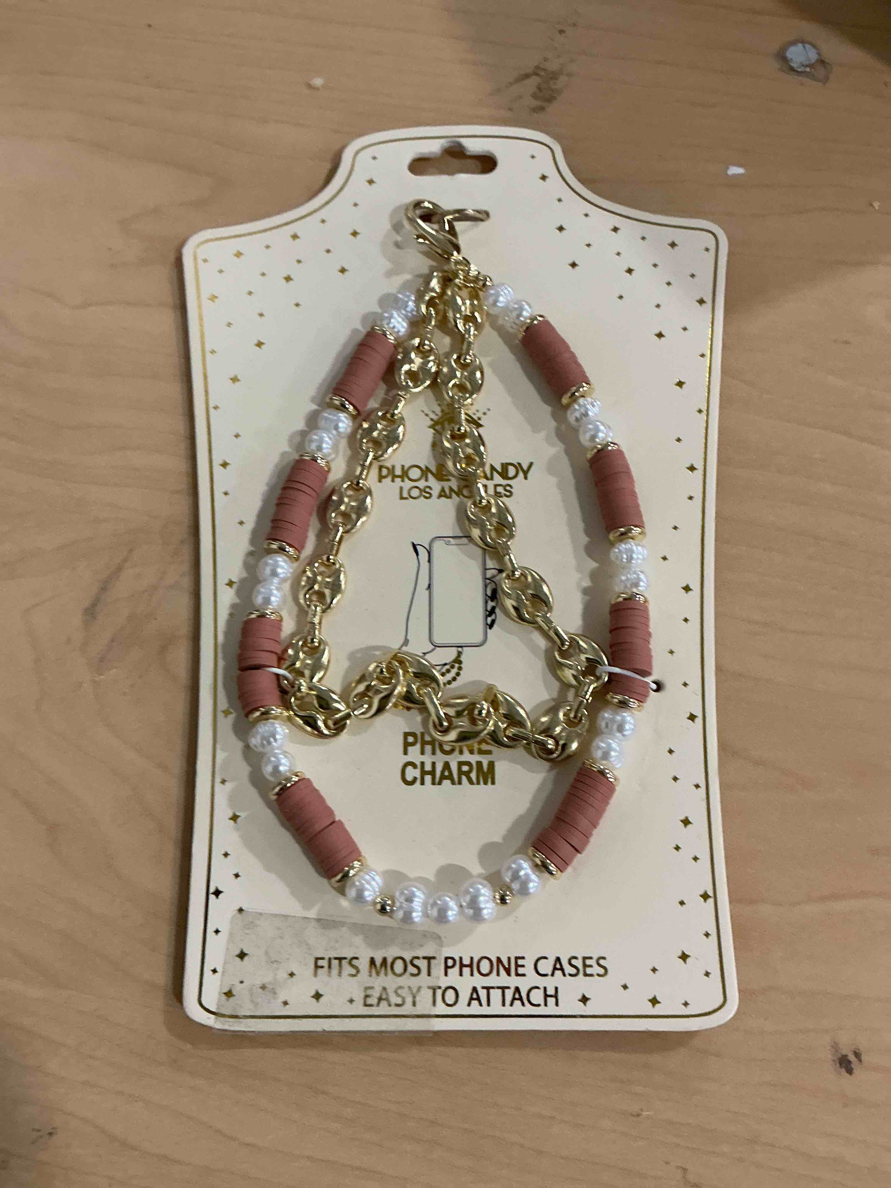 Condition photo showing New/Like New for from candy los angeles, phone charm fits most phone cases