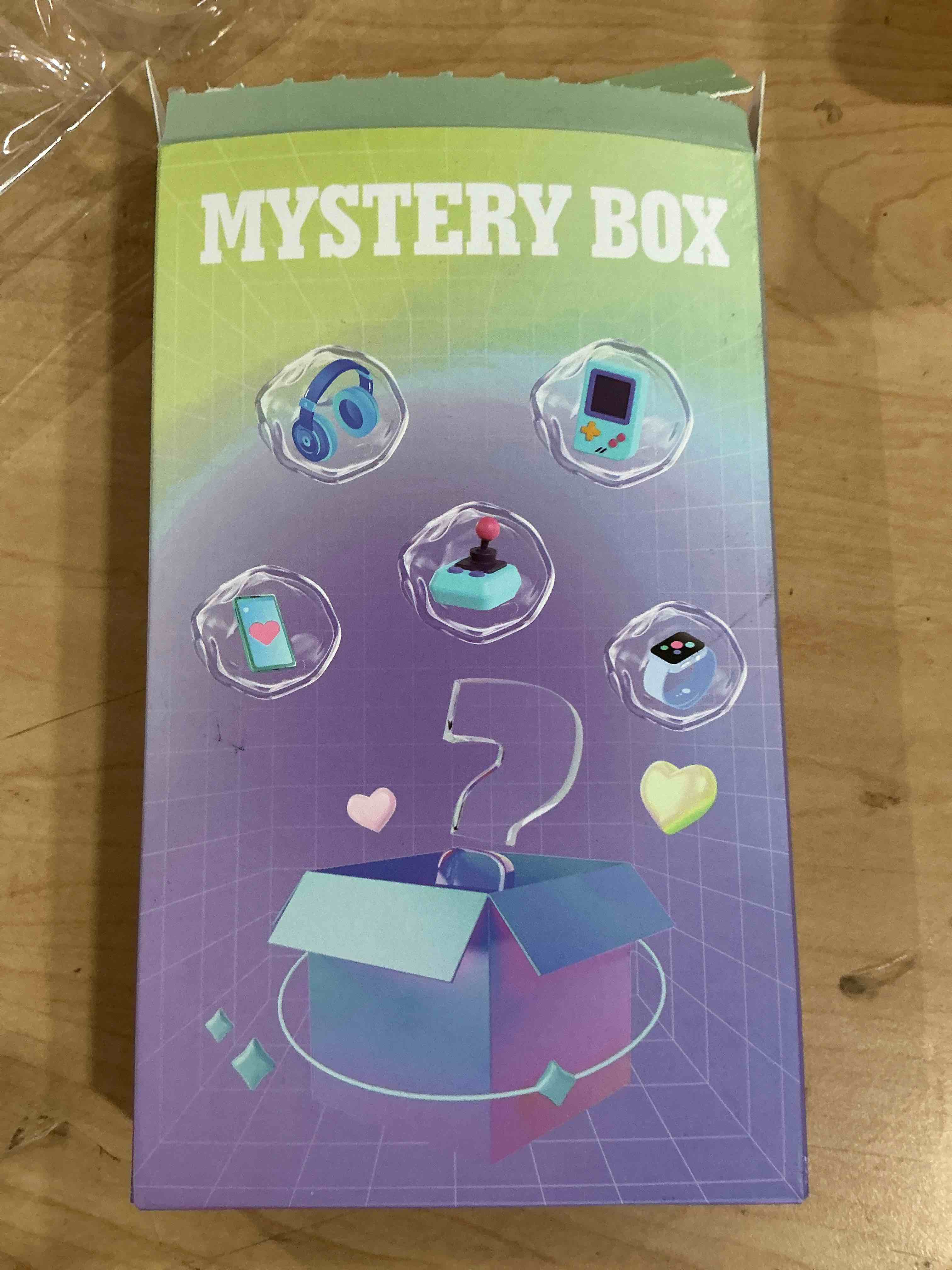 mystery surprise box with kids, mystery watch phone, game, console, controller, or kid headphones