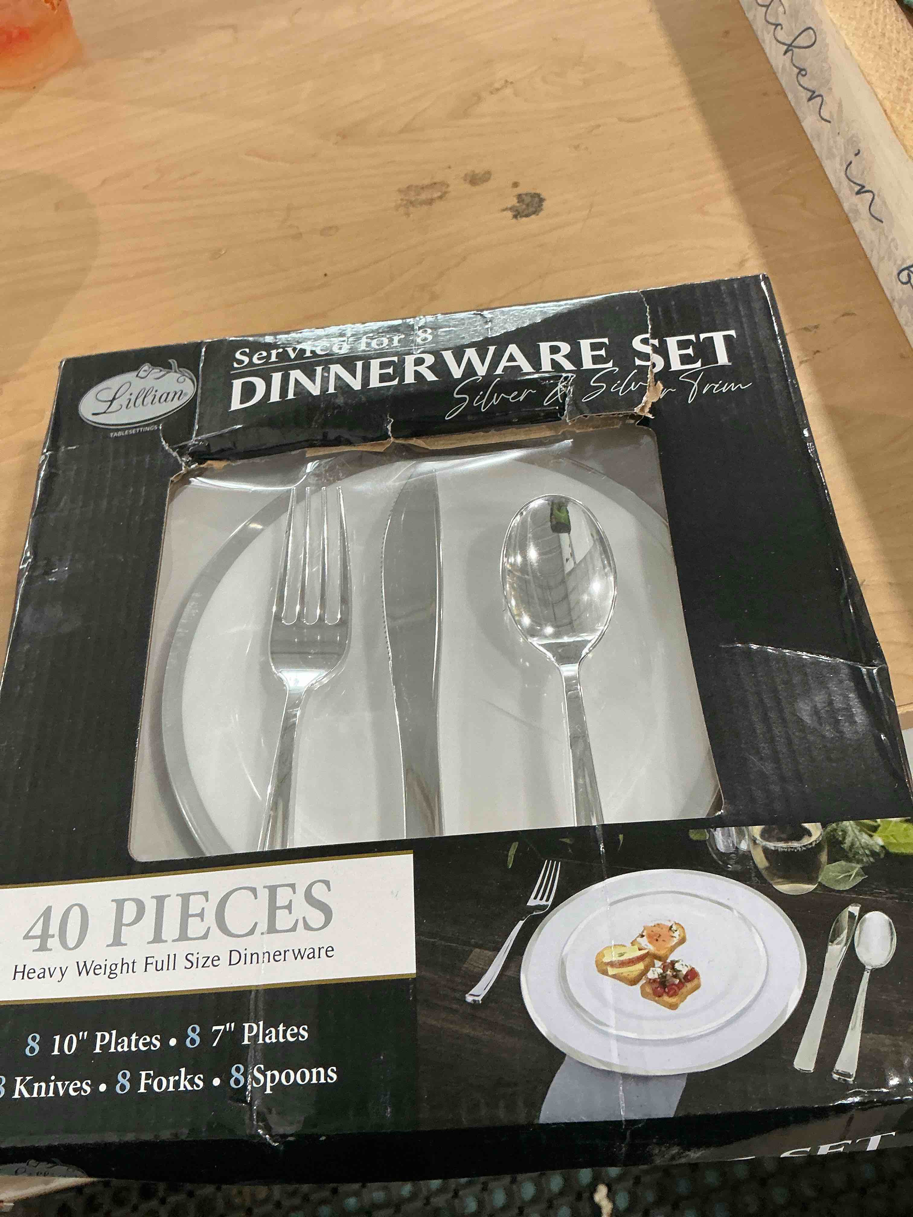 Condition photo showing New/Like New for wellife 48 piece silver plastic dinnerware set for 8 guests, include: 8 dinner plates, 8:dessert plates, 8:pre rolled napkins with silverware and 8silver cups