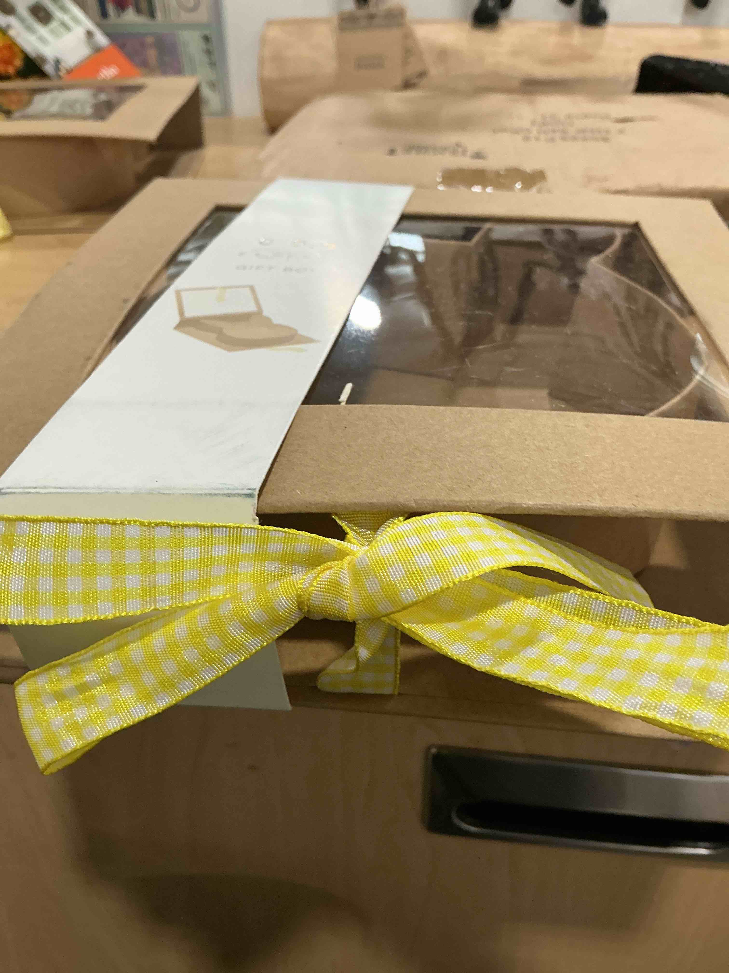 Condition photo showing New/Like New for bunny gift box, cbe, paper tier, top gift box