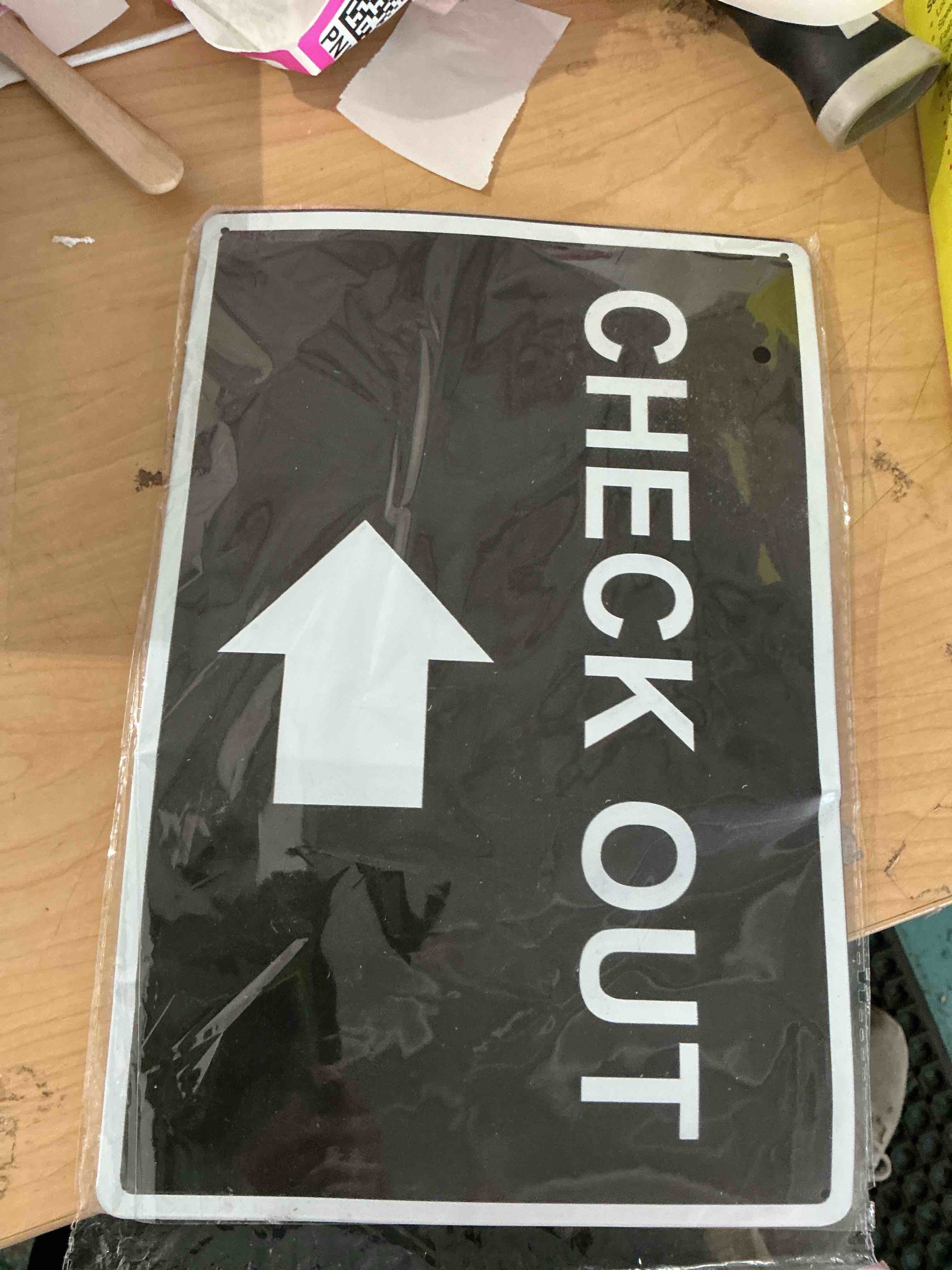 Condition photo showing New/Like New for compliancesigns.com check out (with right arrow) sign, 10x7 inch plastic for wayfinding