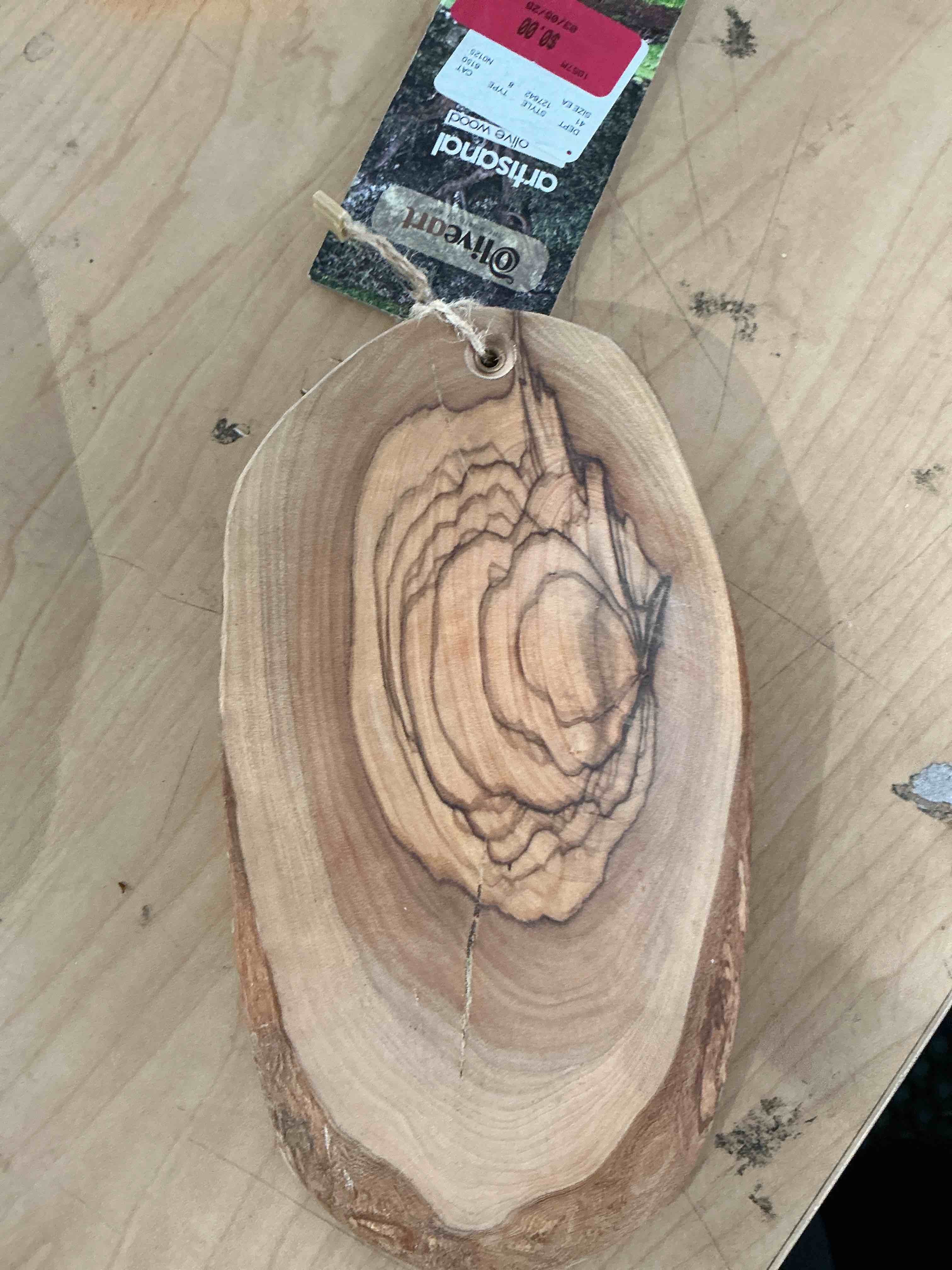 Condition photo showing New/Like New for olive art olive wood decorative piece