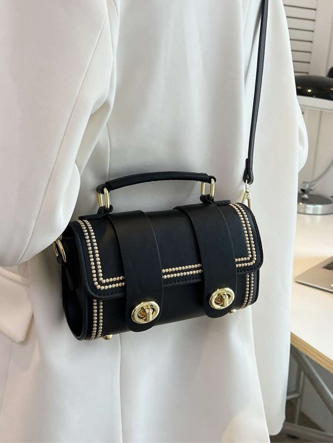 Condition photo showing New/Like New for mini stitch detail twist lock flap square bag 