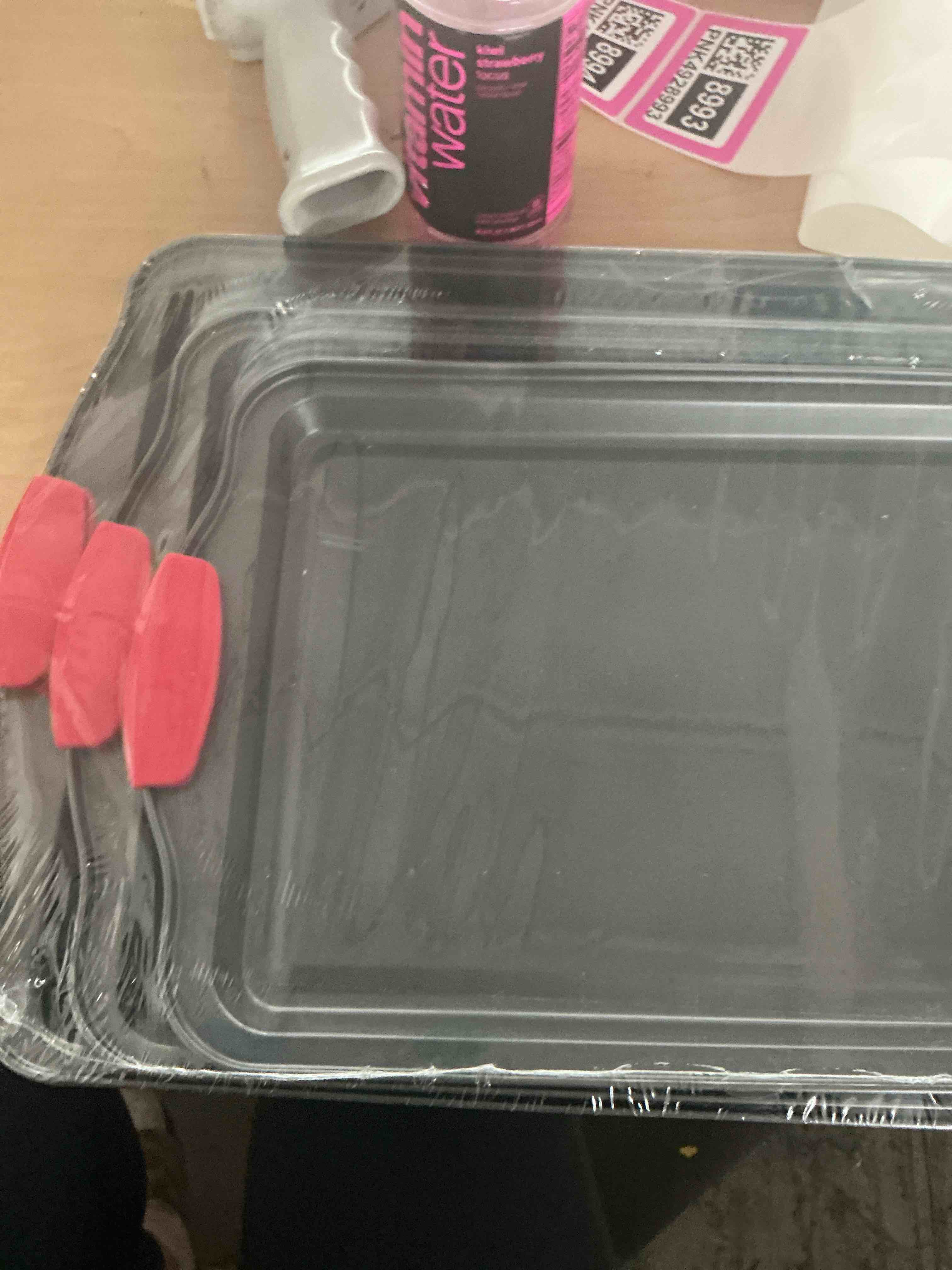 Condition photo showing New/Like New for nutrichef 3-piece nonstick kitchen oven baking pans - premium & stylish non-stick steel, commercial grade restaurant quality metal bakeware with red silicone handles - easy to clean, ncsbs3s 3-piece set