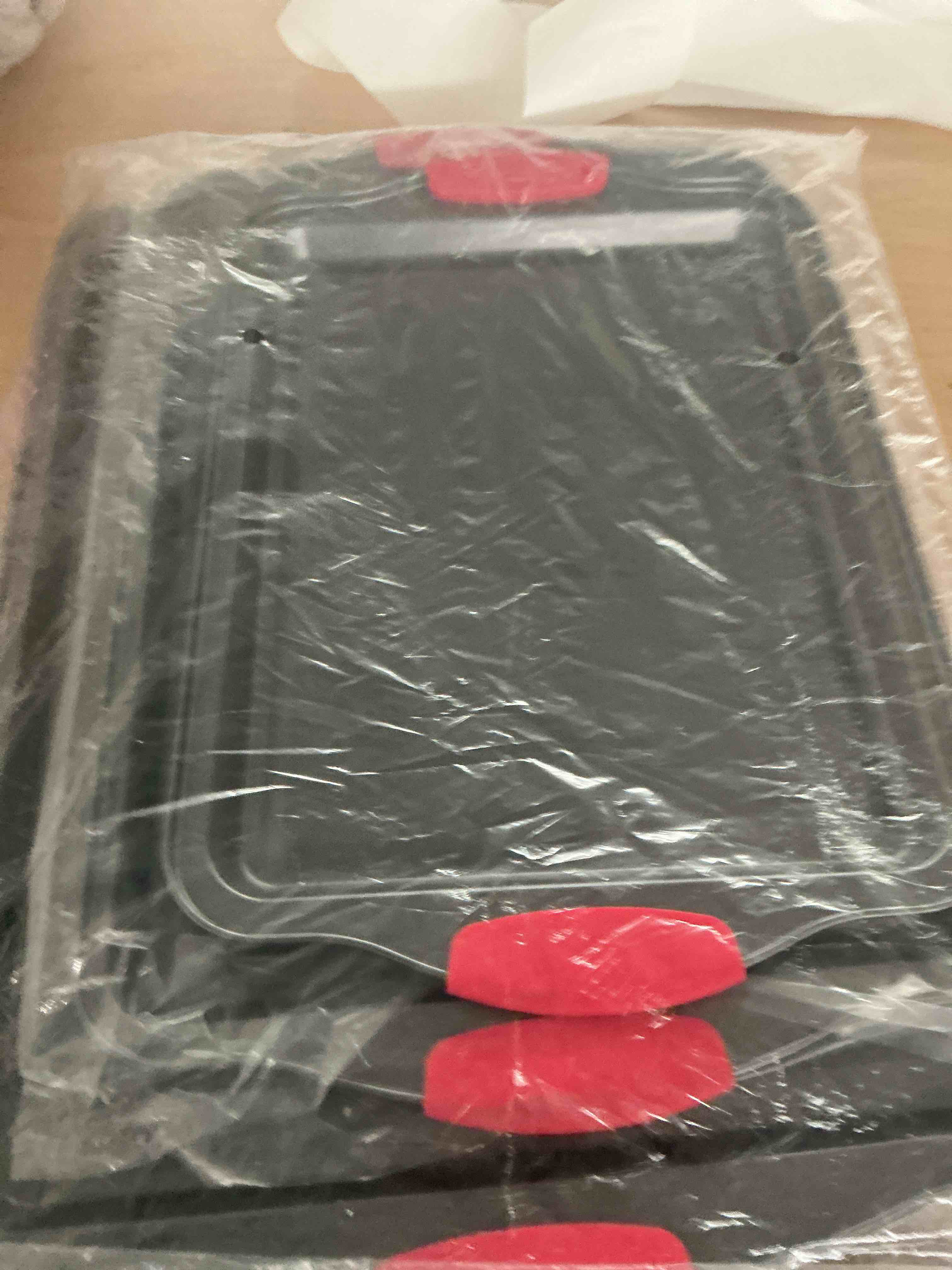 Condition photo showing New/Like New for nutrichef 3-piece nonstick kitchen oven baking pans - premium & stylish non-stick steel, commercial grade restaurant quality metal bakeware with red silicone handles - easy to clean, ncsbs3s 3-piece set