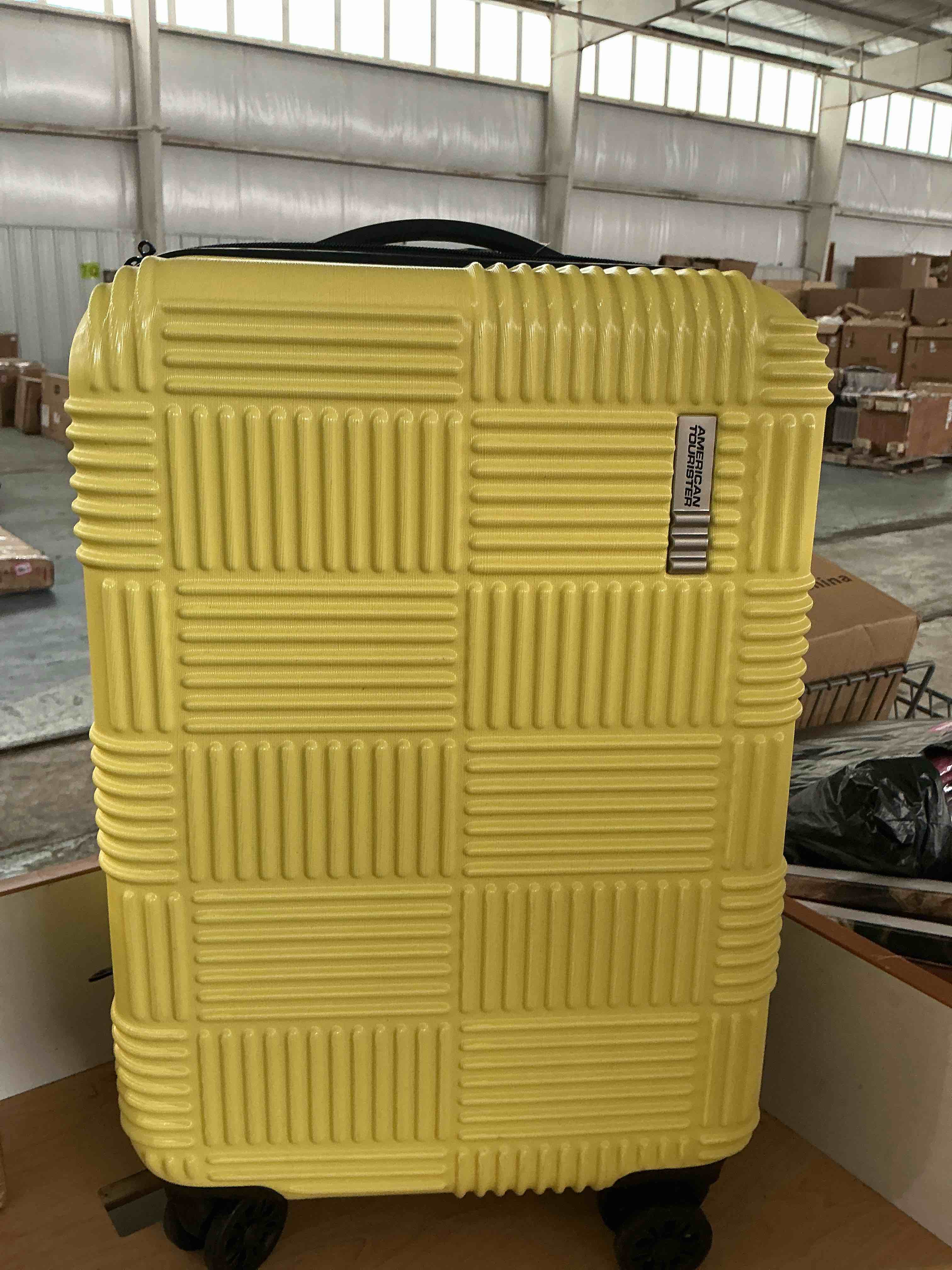 Condition photo showing New/Like New for american tourister stratum 3.0 carry-on spinner, airline approved, durable hardside luggage, expands 1.5", rightheight™ adjustable handle, yellow