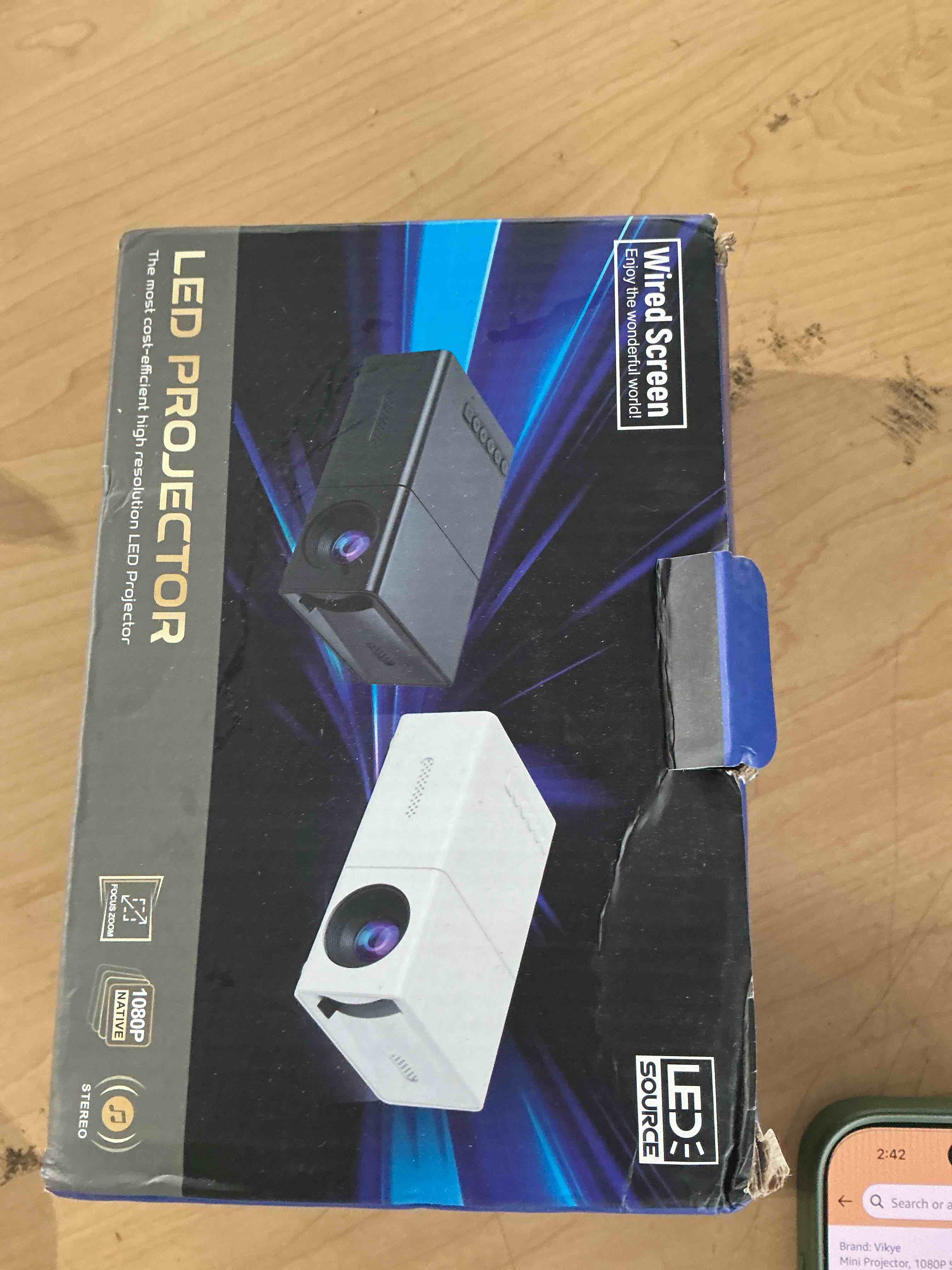 Condition photo showing New/Like New for portable mini led projector 1080p supported wired phone screen mirroring for home theater movie