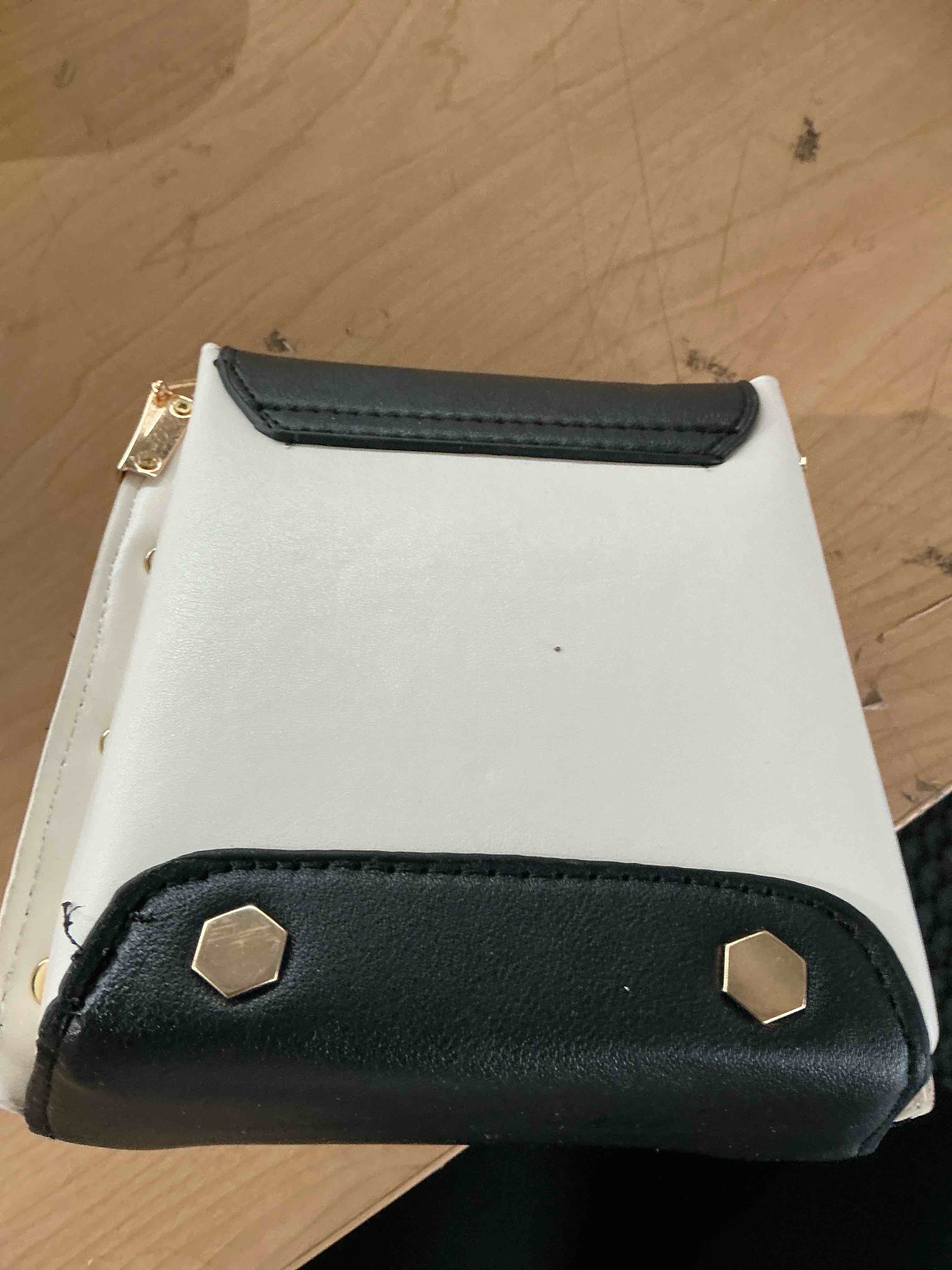 Condition photo showing New/Like New for woman’s handbag beige
