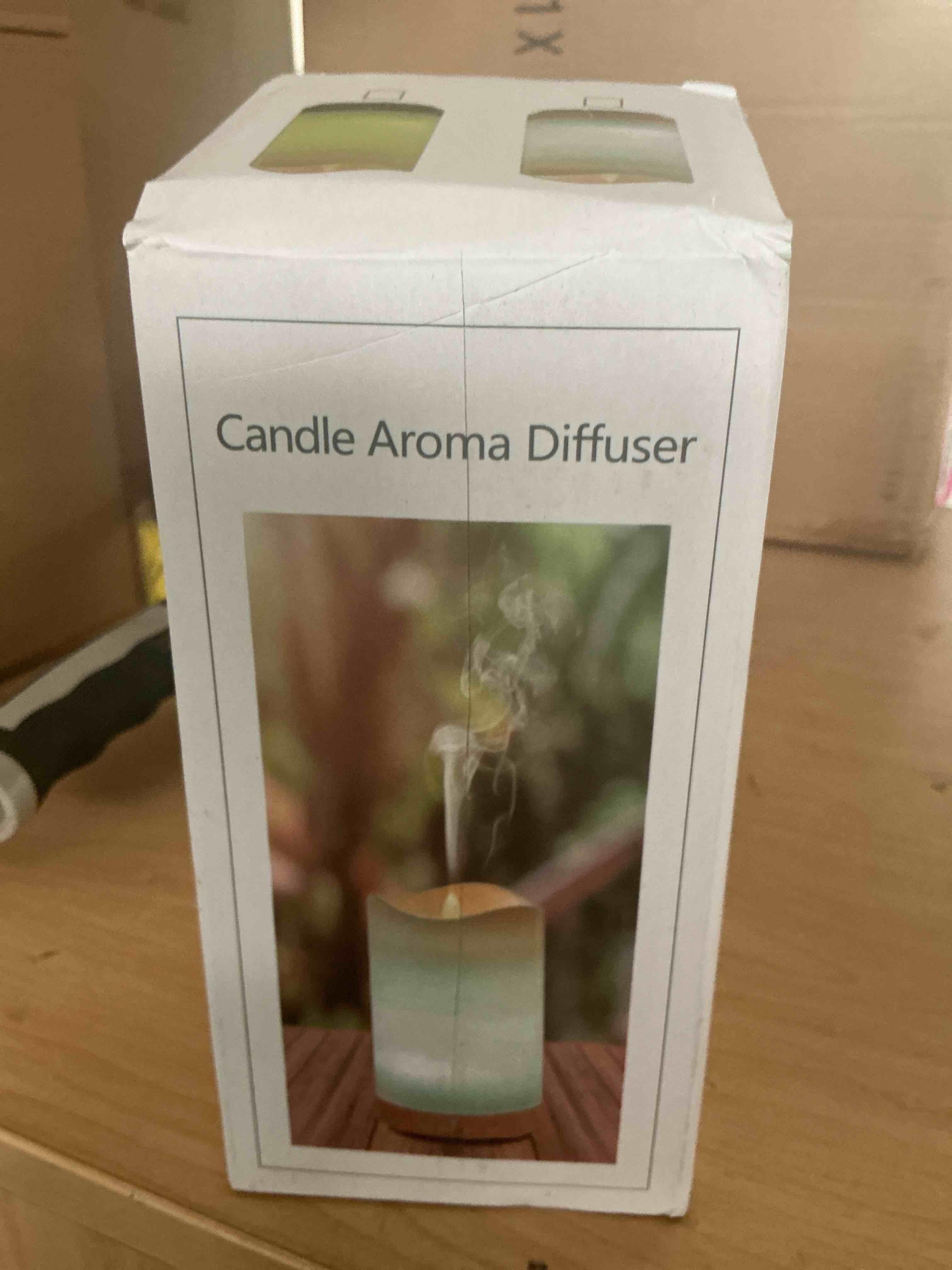 Condition photo showing New/Like New for flameless candle diffuser with led flame effect- ultrasonic essential oil diffuser-130ml cool mist aroma diffuser for home,bedroom and office
