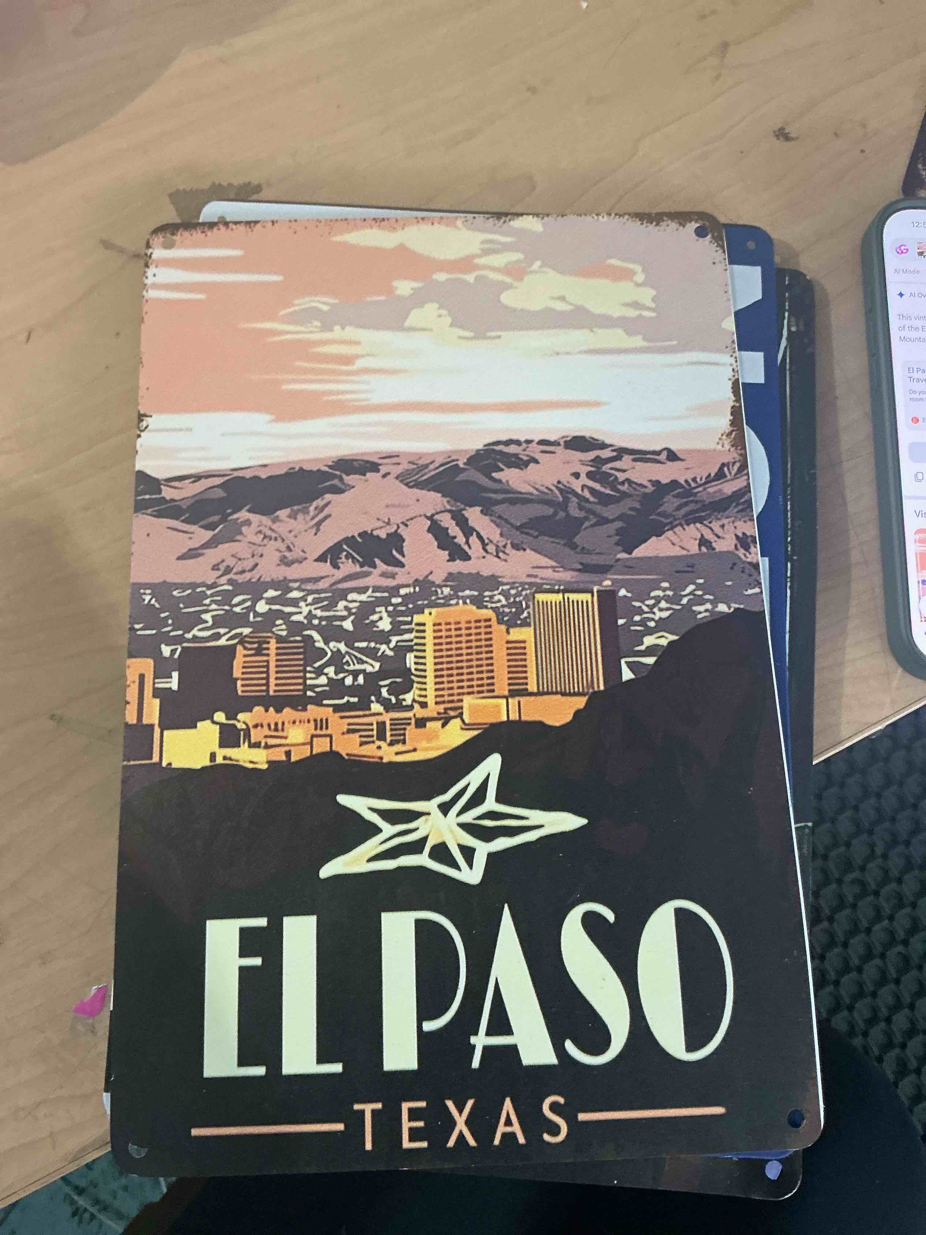 style thin sign, features eight scenic sunset view of the El Paso city escape, and the Franklin Mountains
