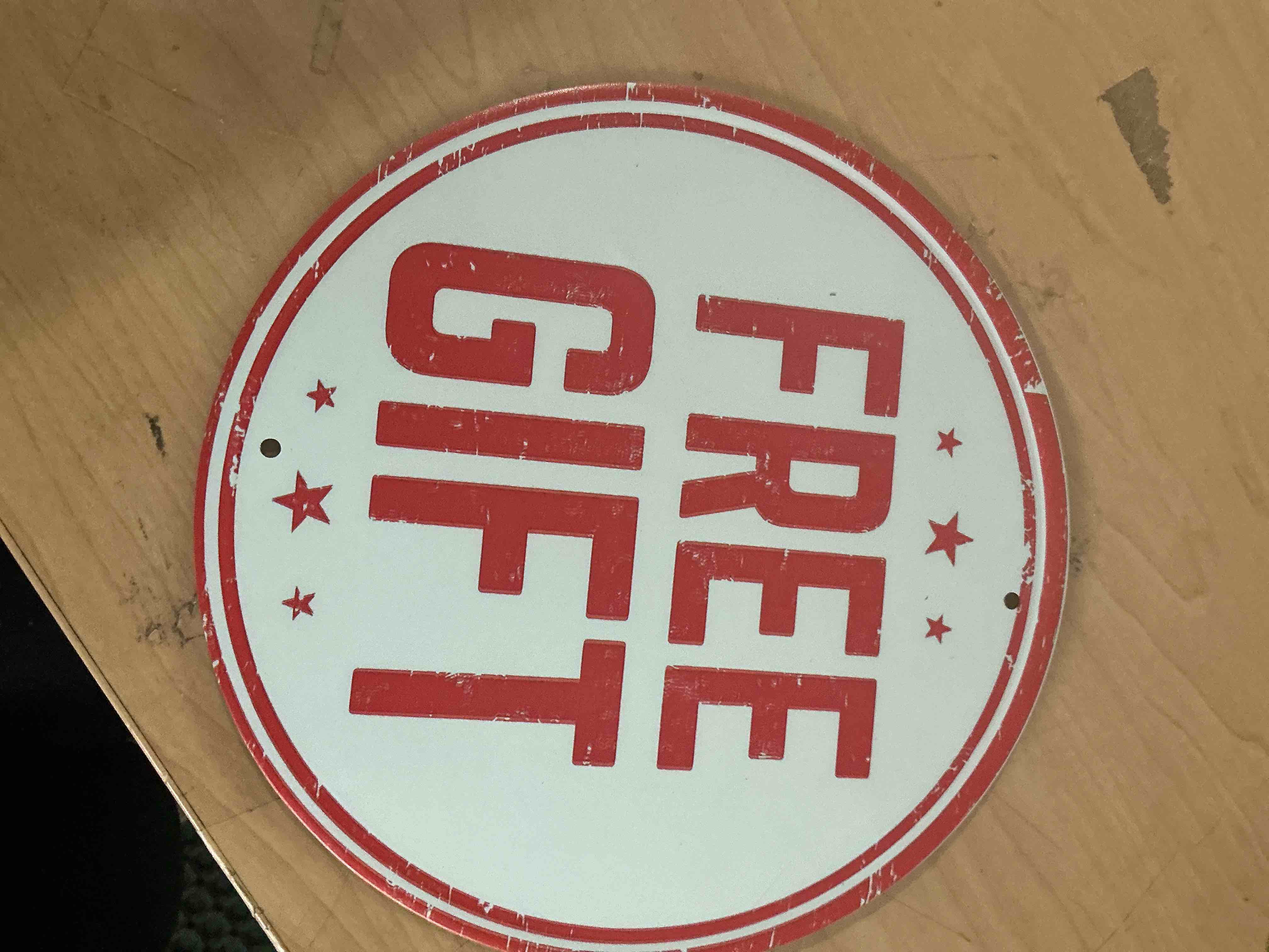 vintage style circular FREE GIFT sign is made of durable, aluminum and design for retail, promotions or decorative display