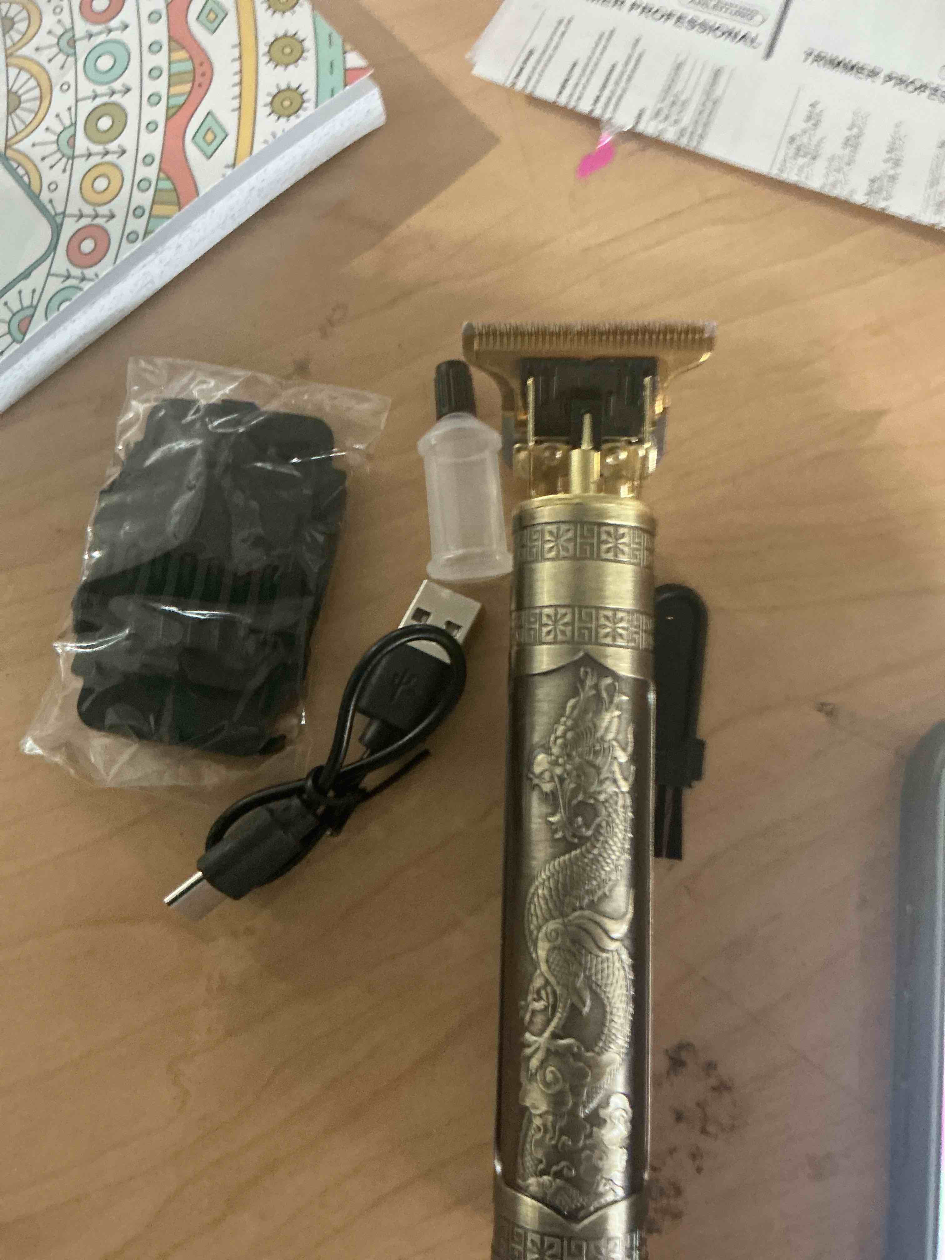 Condition photo showing New/Like New for hair clippers for men, cordless electric hair trimmer rechargeable beard trimmer shaver, electric t blade trimmer zero gapped edgers hair cutting kit with guide combs(dragon) dragon-gold