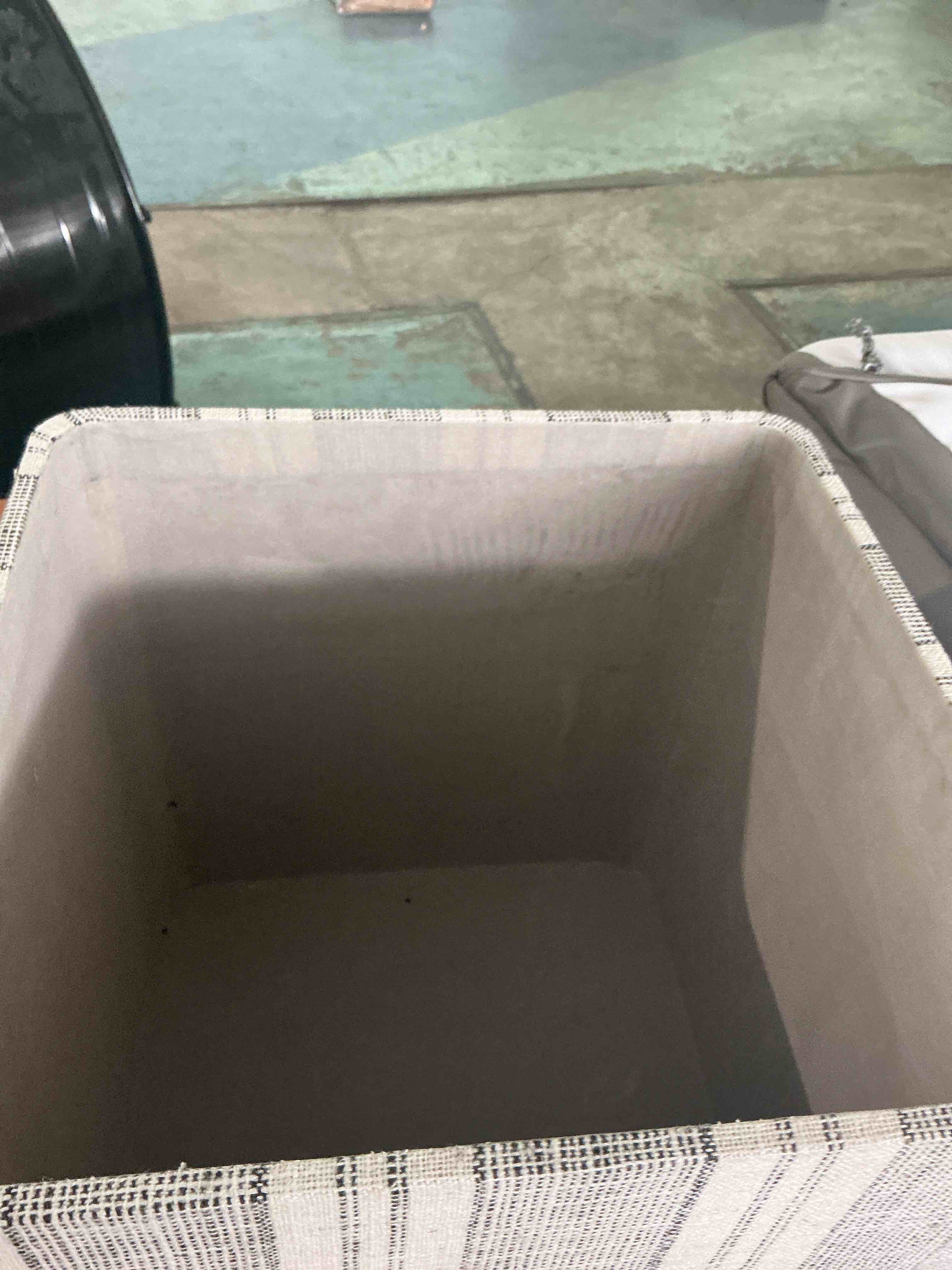 Condition photo showing Good Condition for fabric bin, bright, and white textured, striped for toys.
